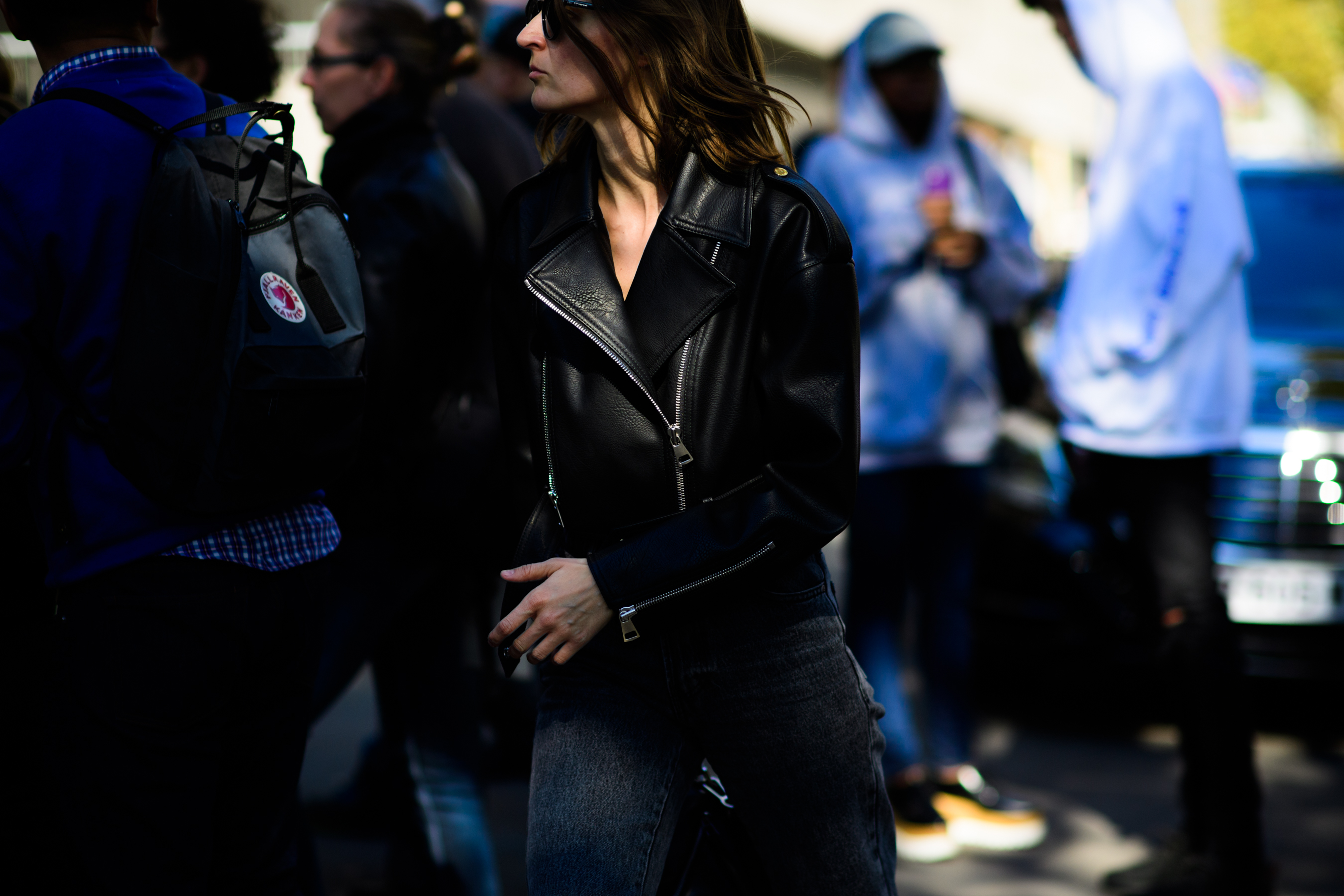 Woman wearing black leather jacket
