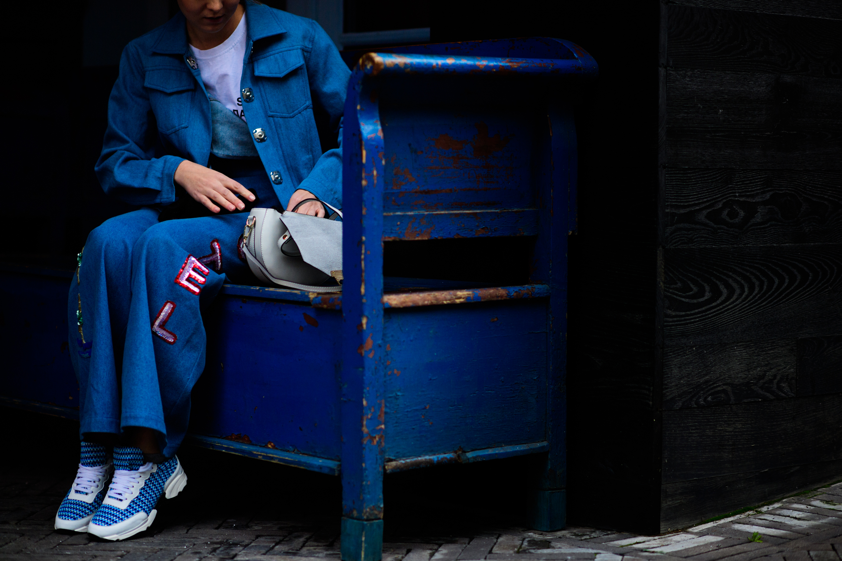 Woman wearing blue denim outfit