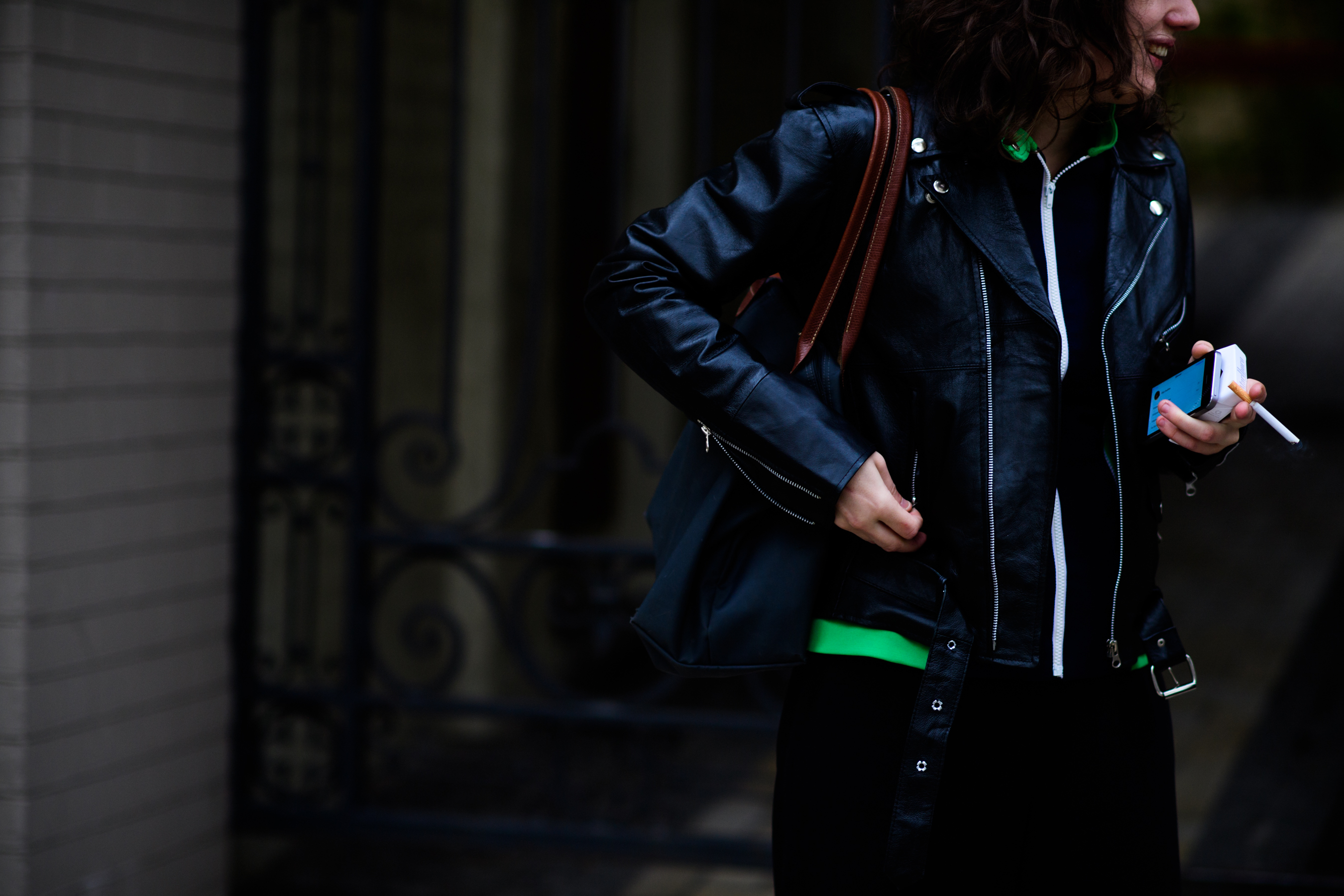 Girl wearing black leather jacket
