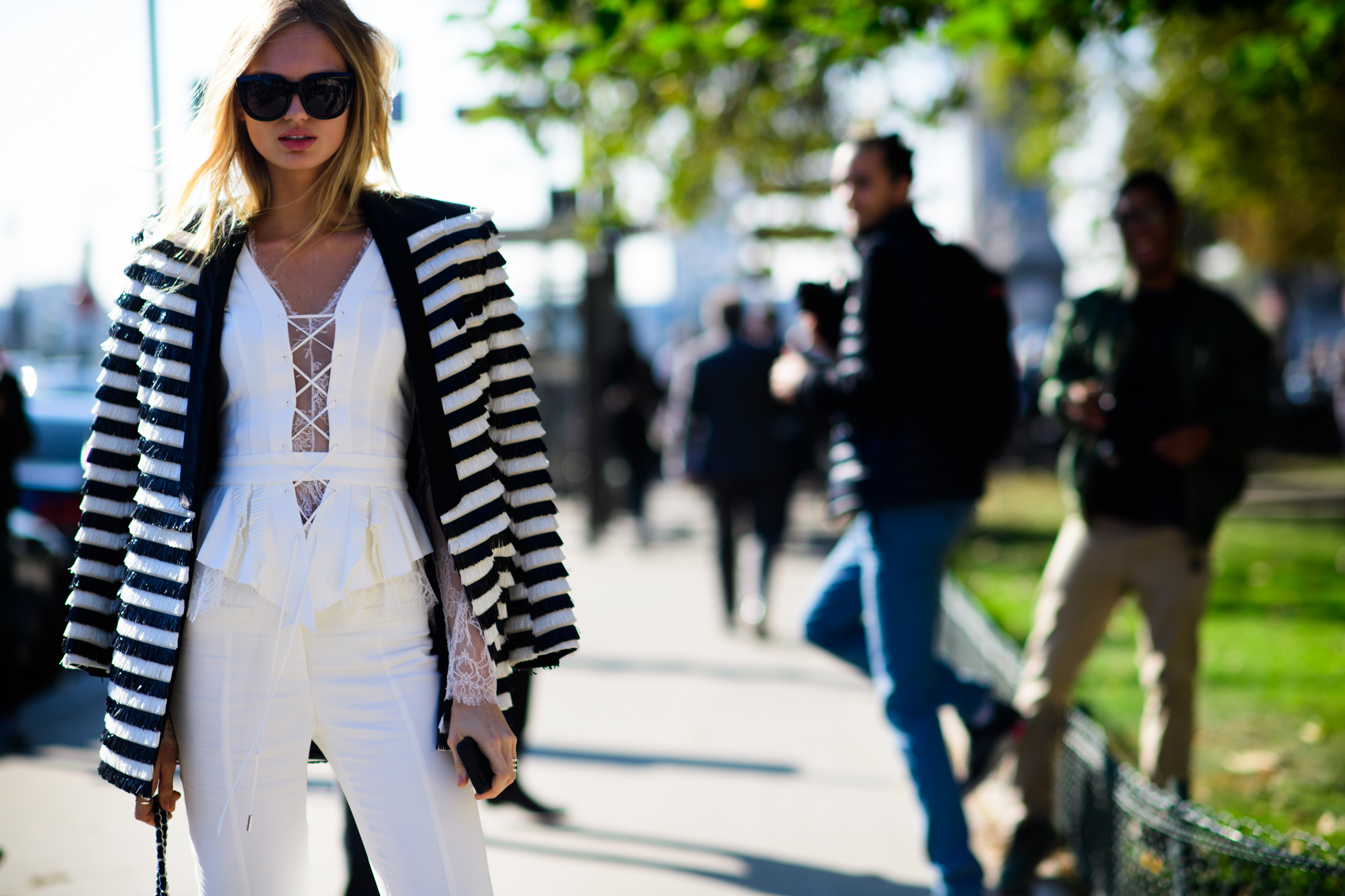 Dutch model wearing black and white striped jacket