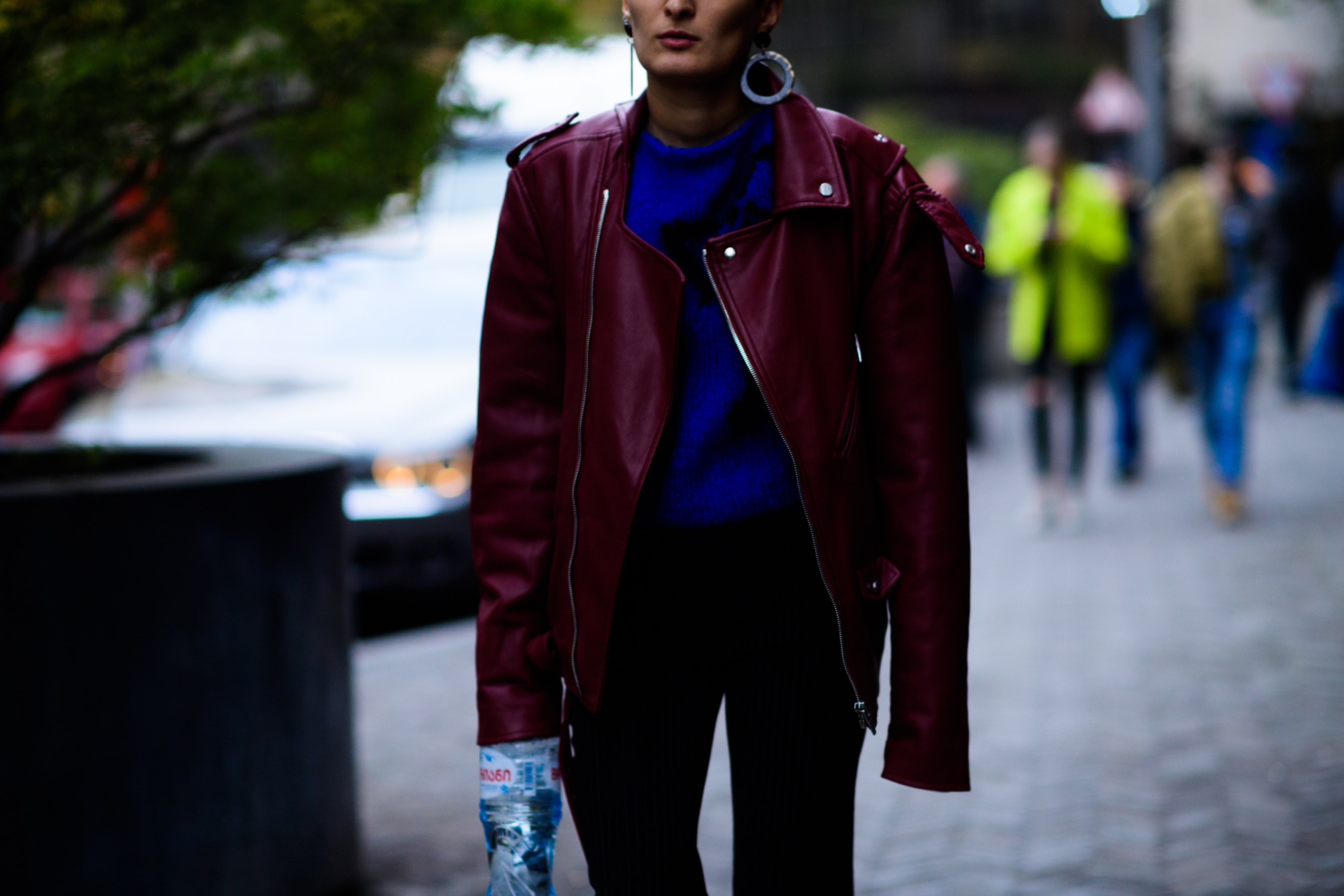 Woman wearing oversized red jacket