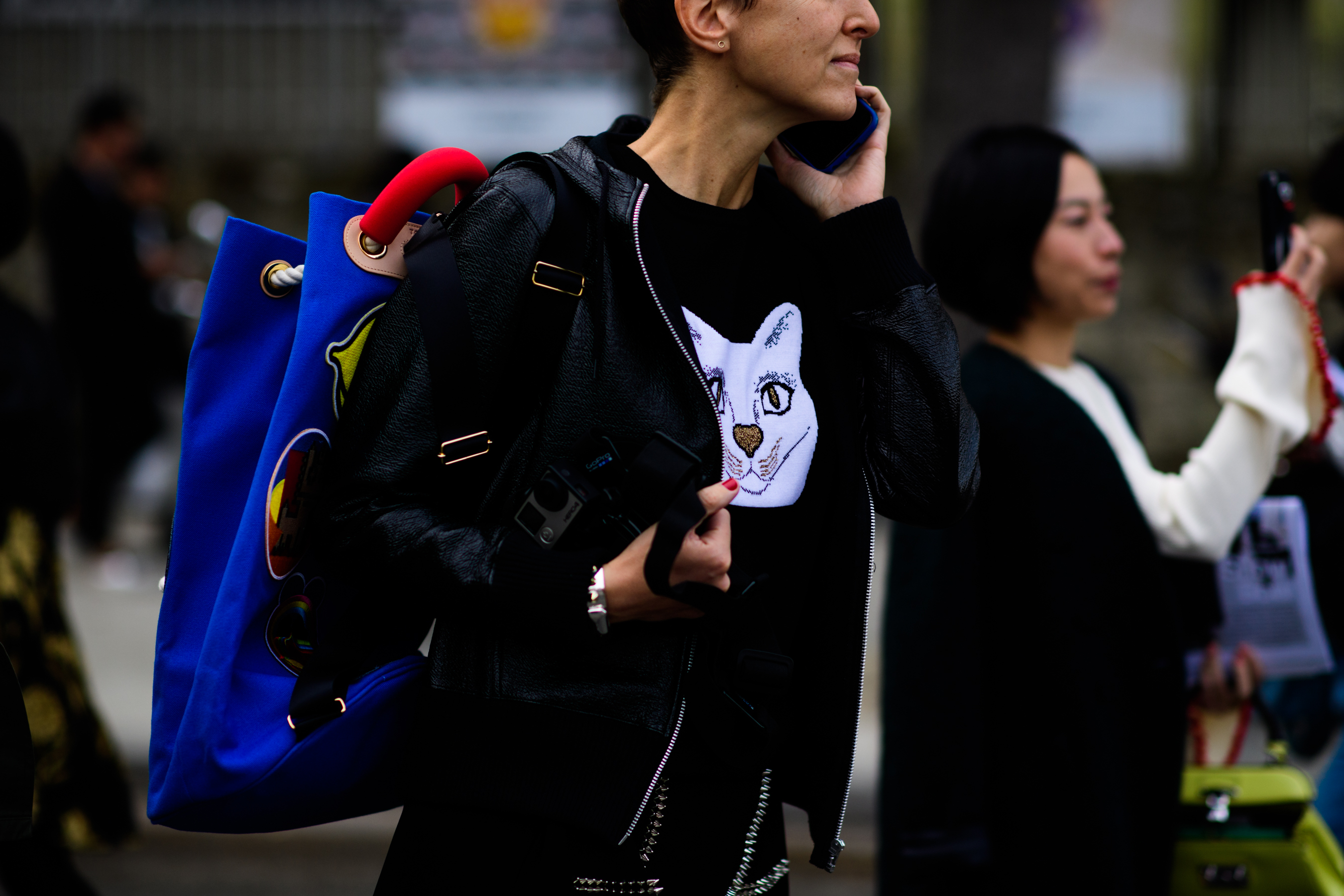 French woman wearing animal motif sweater