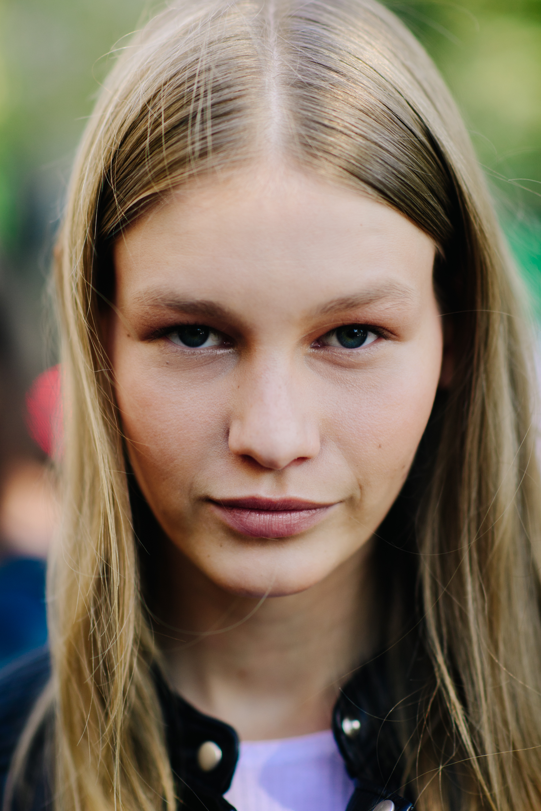 Portrait of model with blonde hair and blue eyes