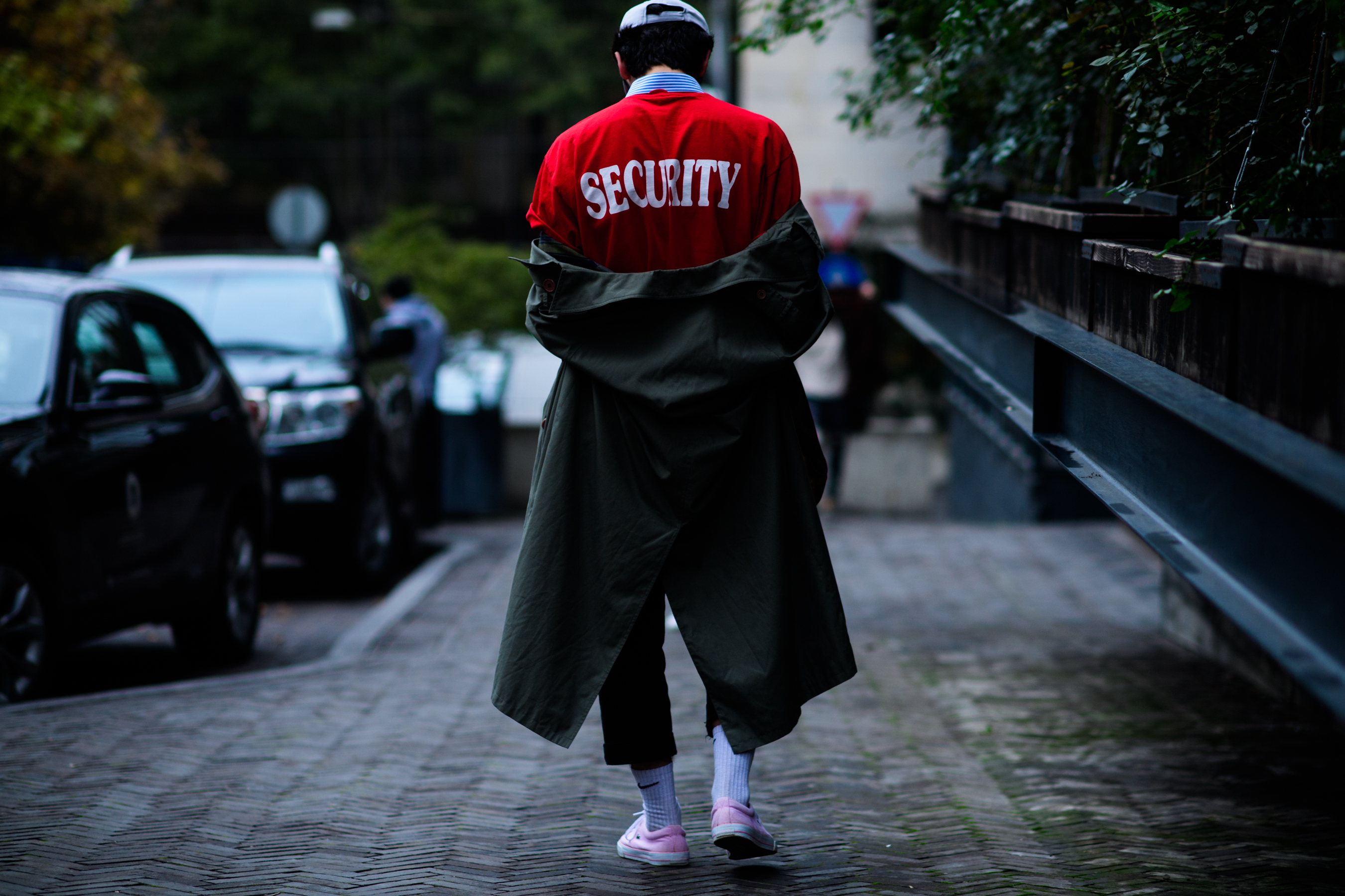 Man wearing Security red t-shirt