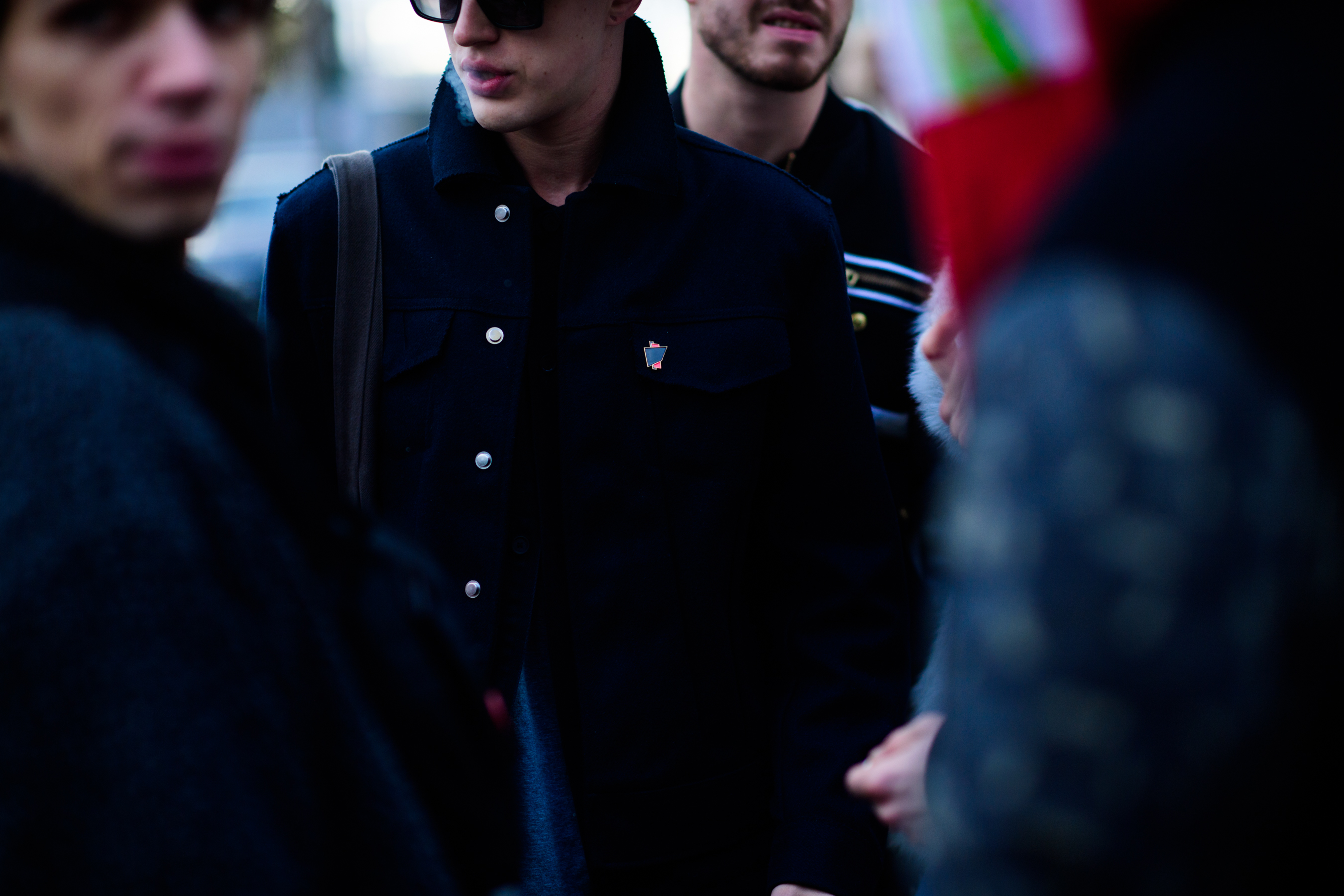 Group of men attending Fashion Week