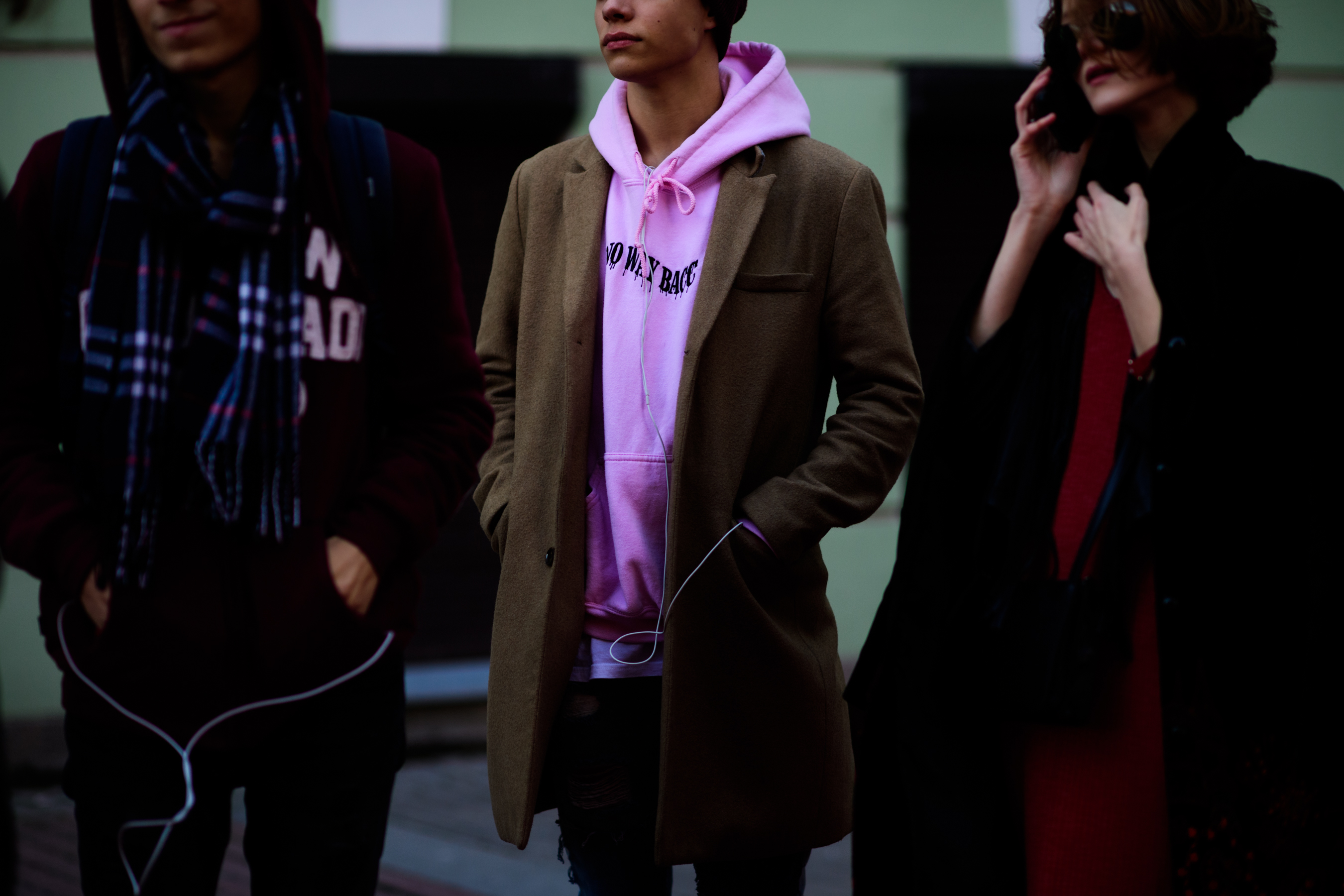 Boy wearing pink hoodie