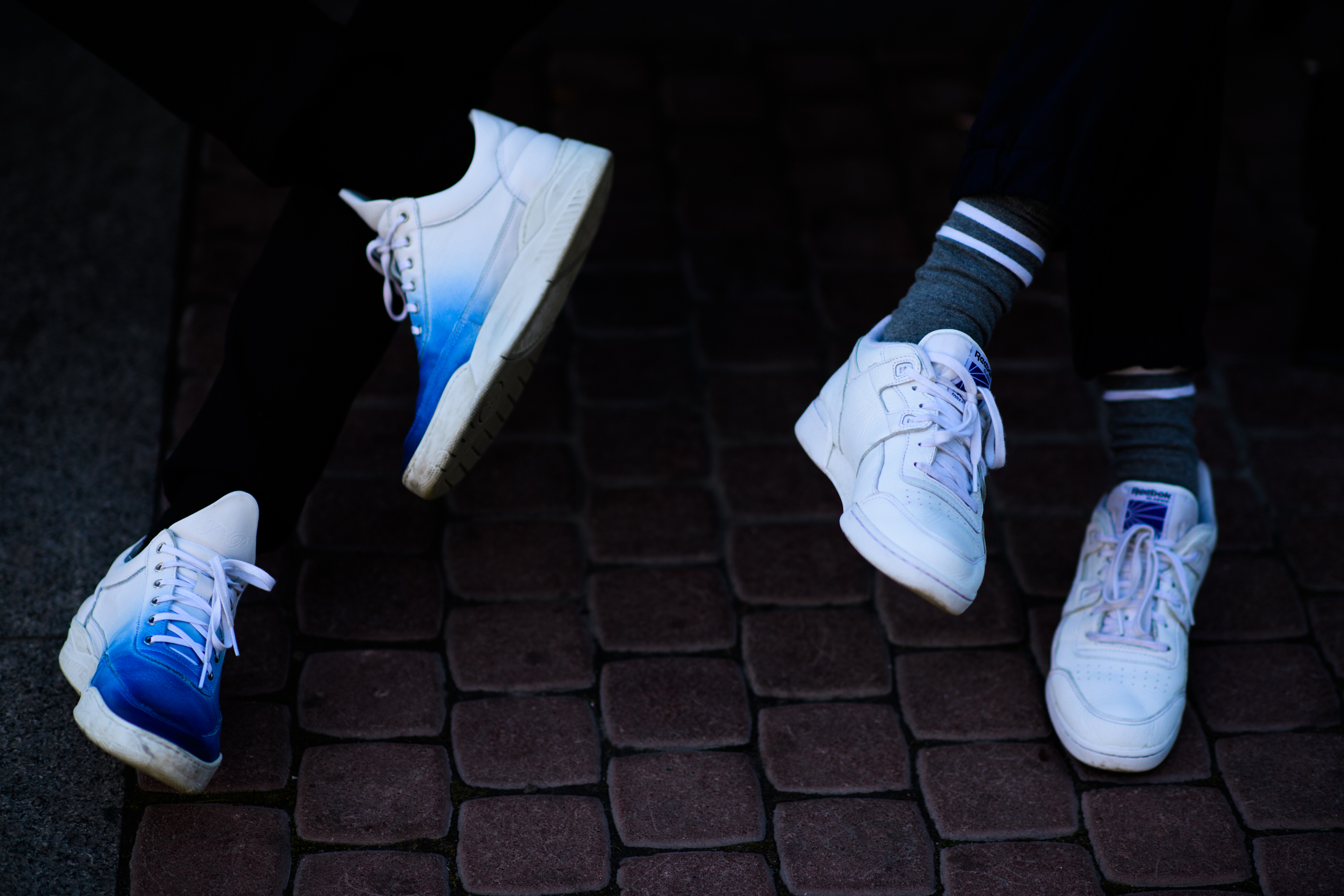 Two Russian boys wearing white sneakers