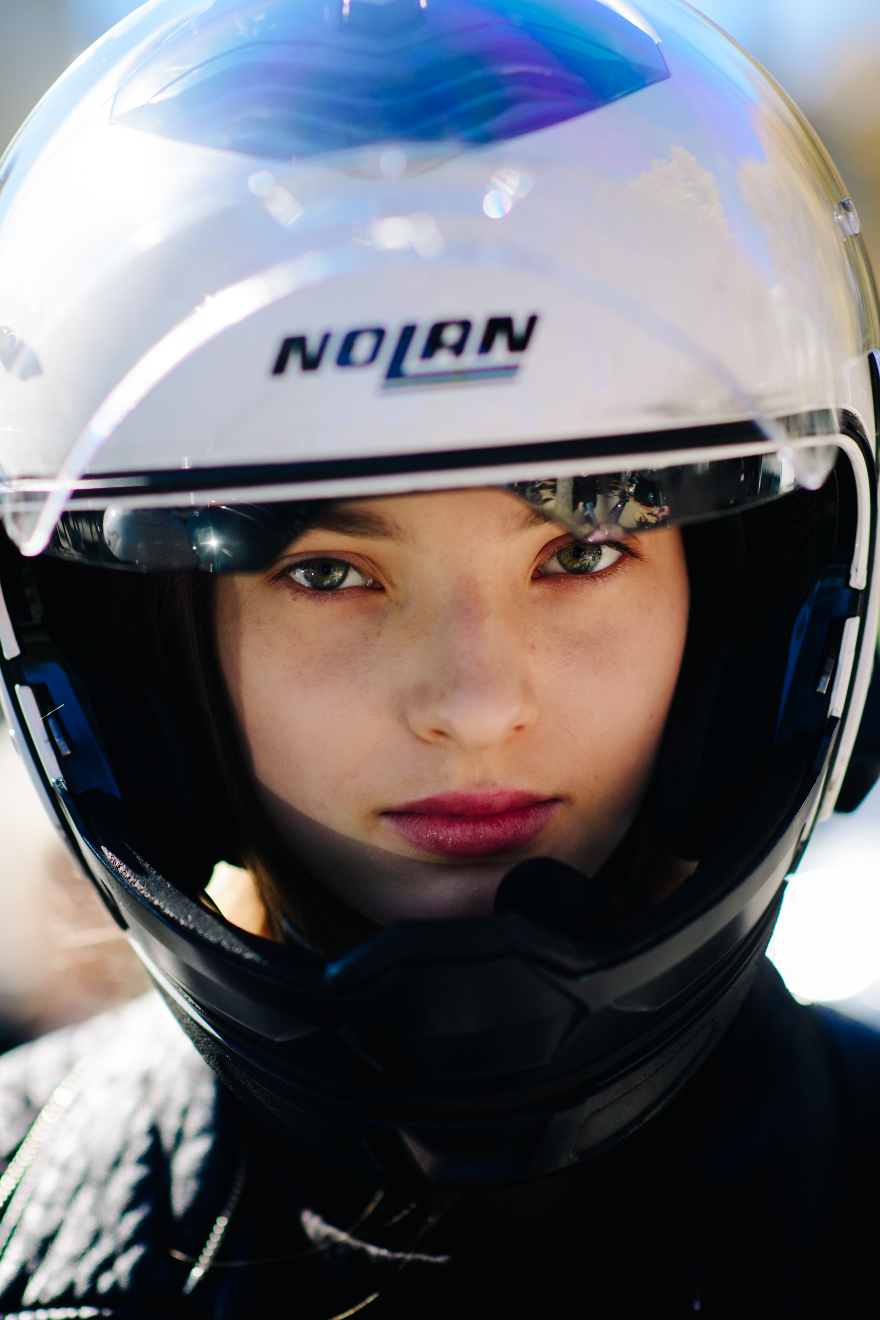 Portrait of model wearing motorcycle helmet