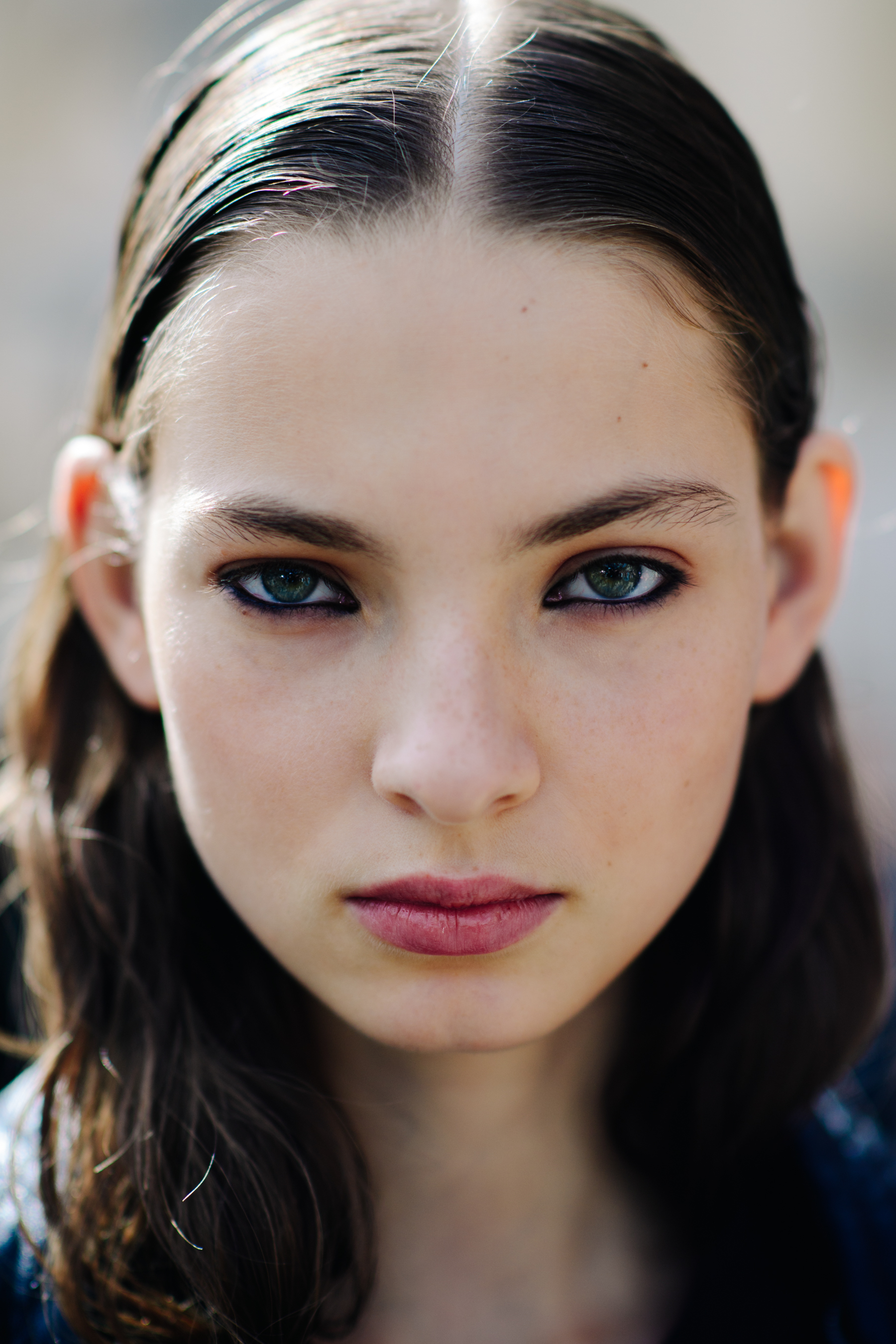 Portrait of model with green eyes and brown hair