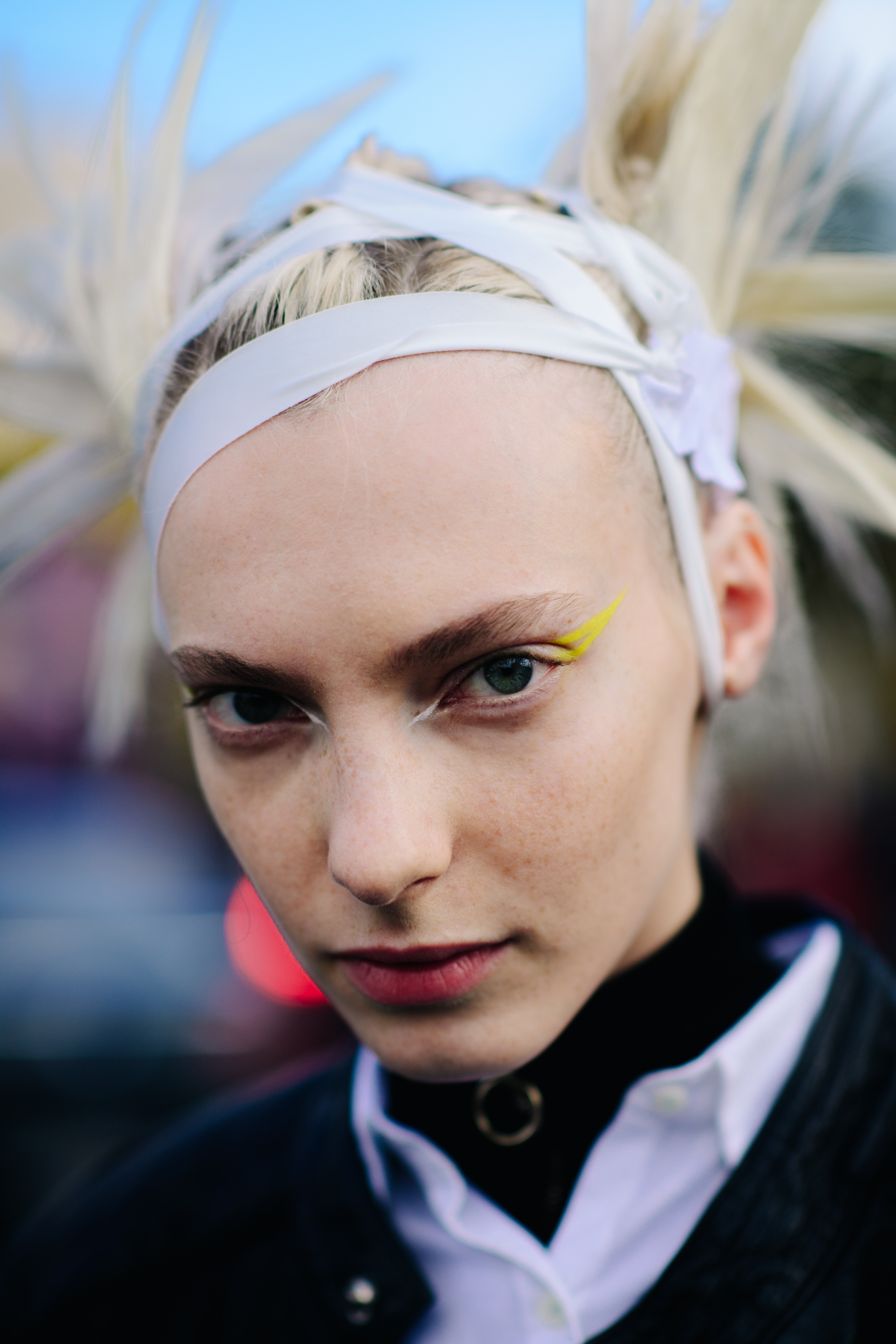 Portrait of model with yellow eye makeup