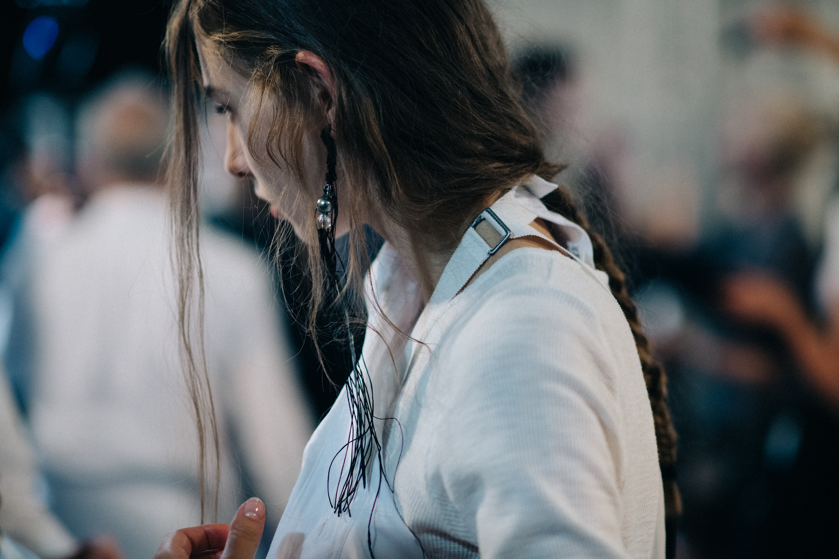 Model wearing white jacket