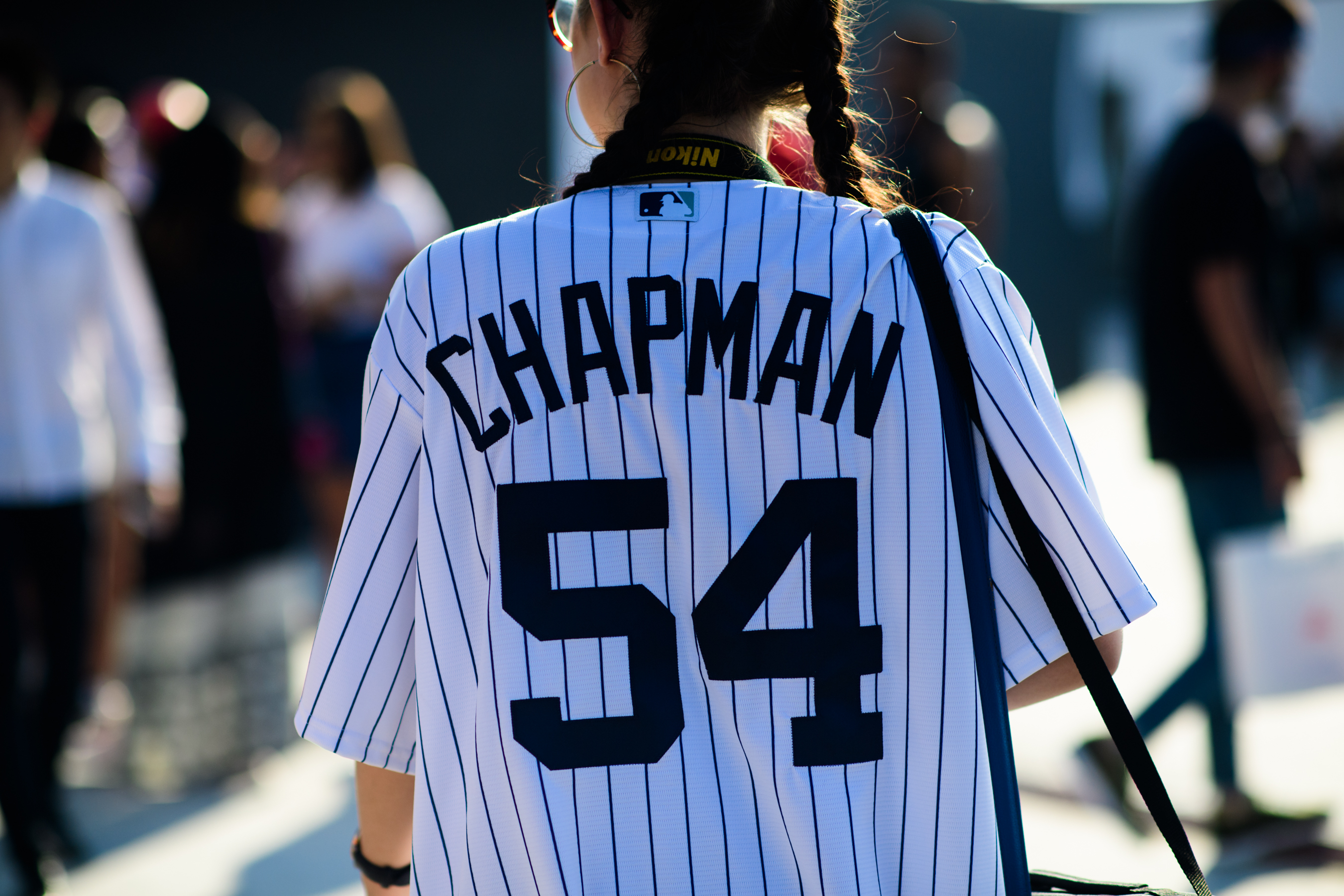 Woman wearing baseball t-shirt