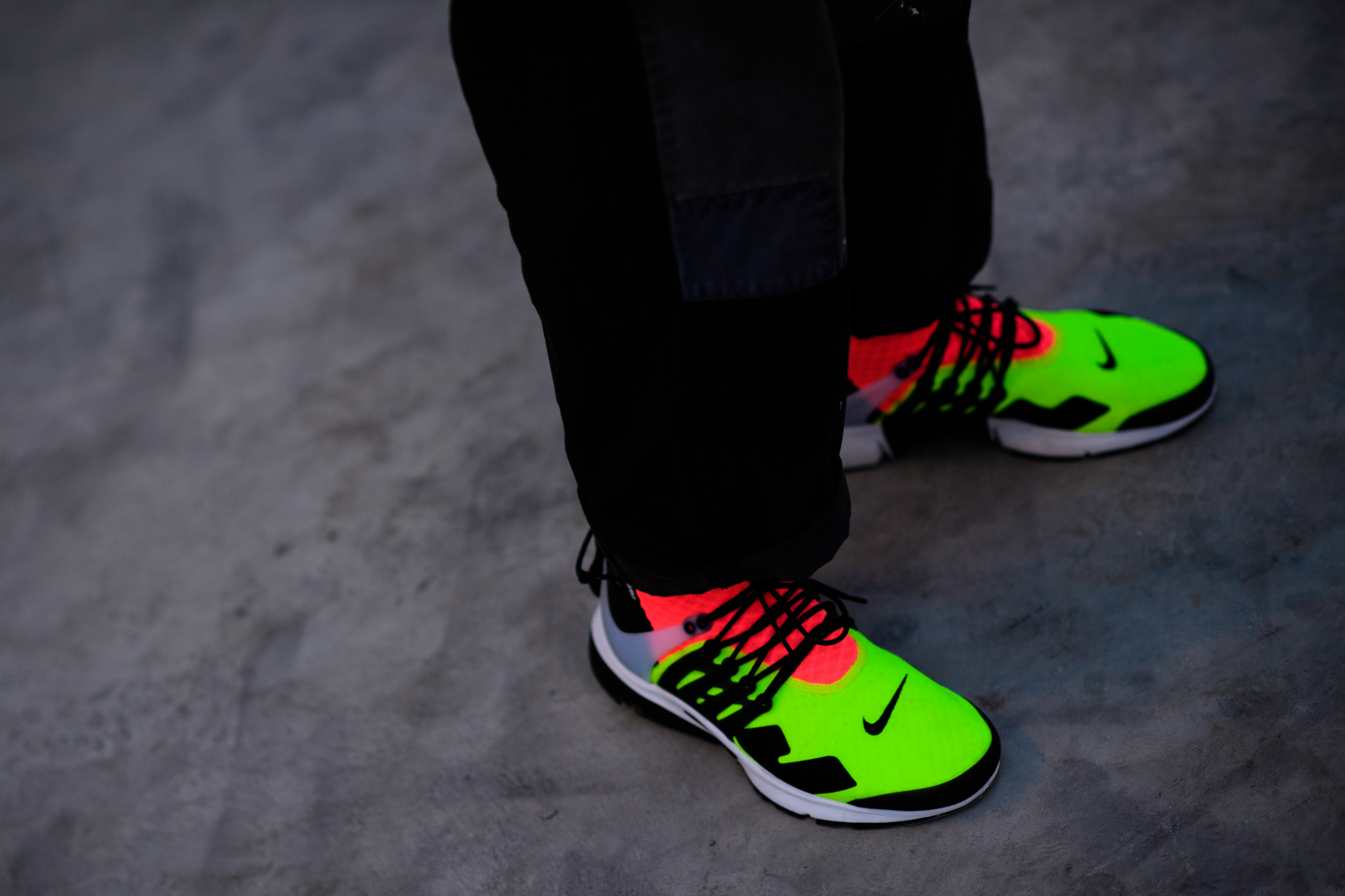 Green and pink nike shoes