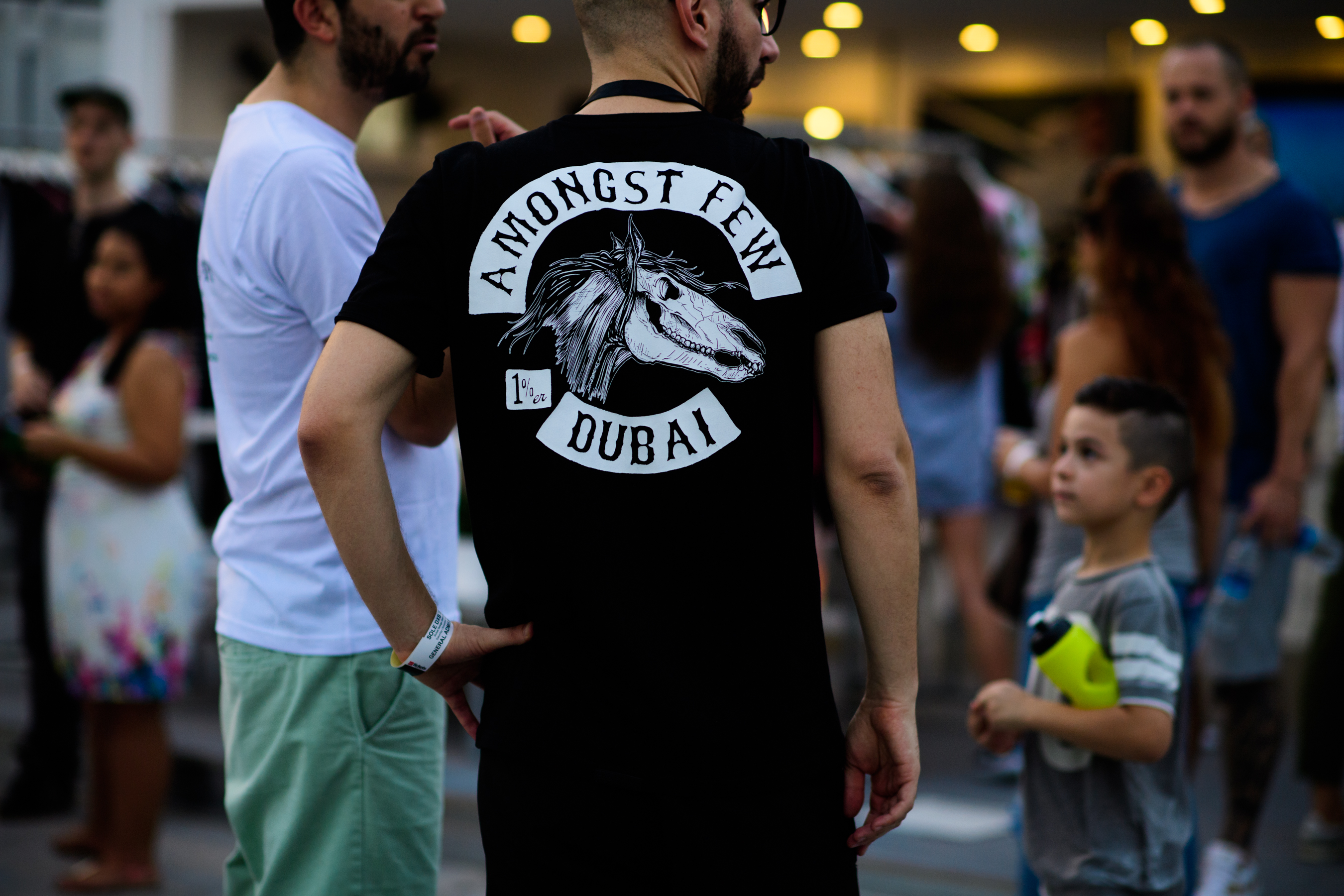 Man wearing Amongst Few t-shirt