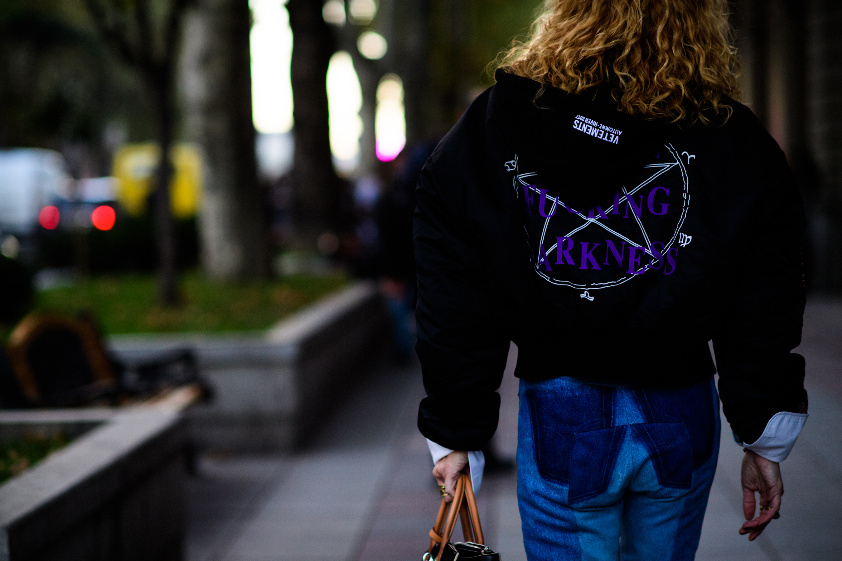 French woman wearing Vetements hoodie