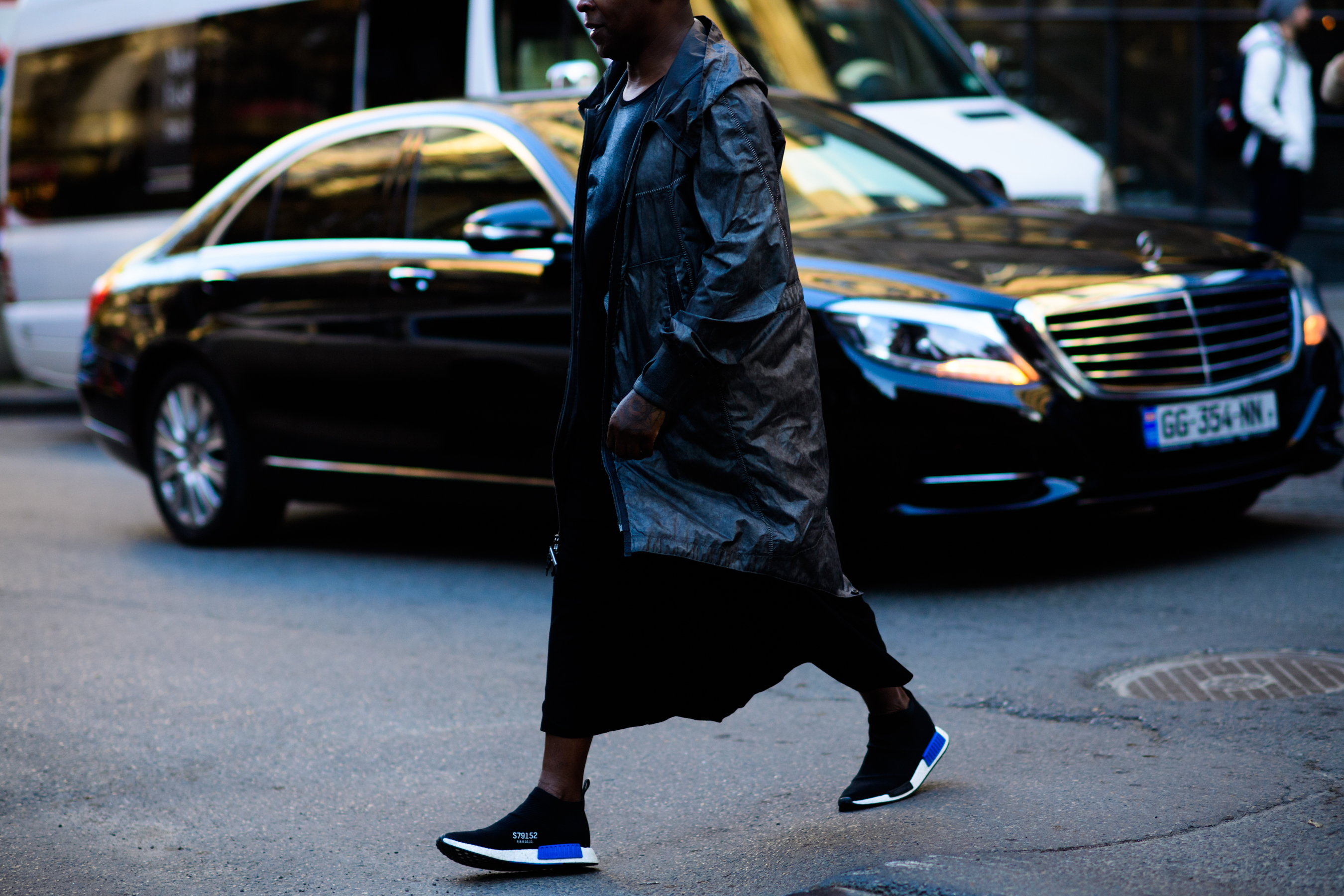 Man wearing black shiny parka