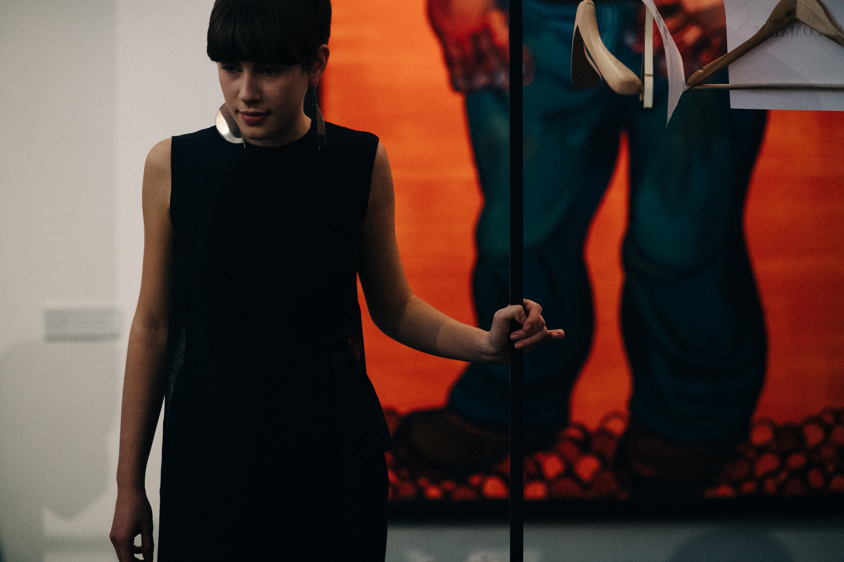 Model wearing black dress
