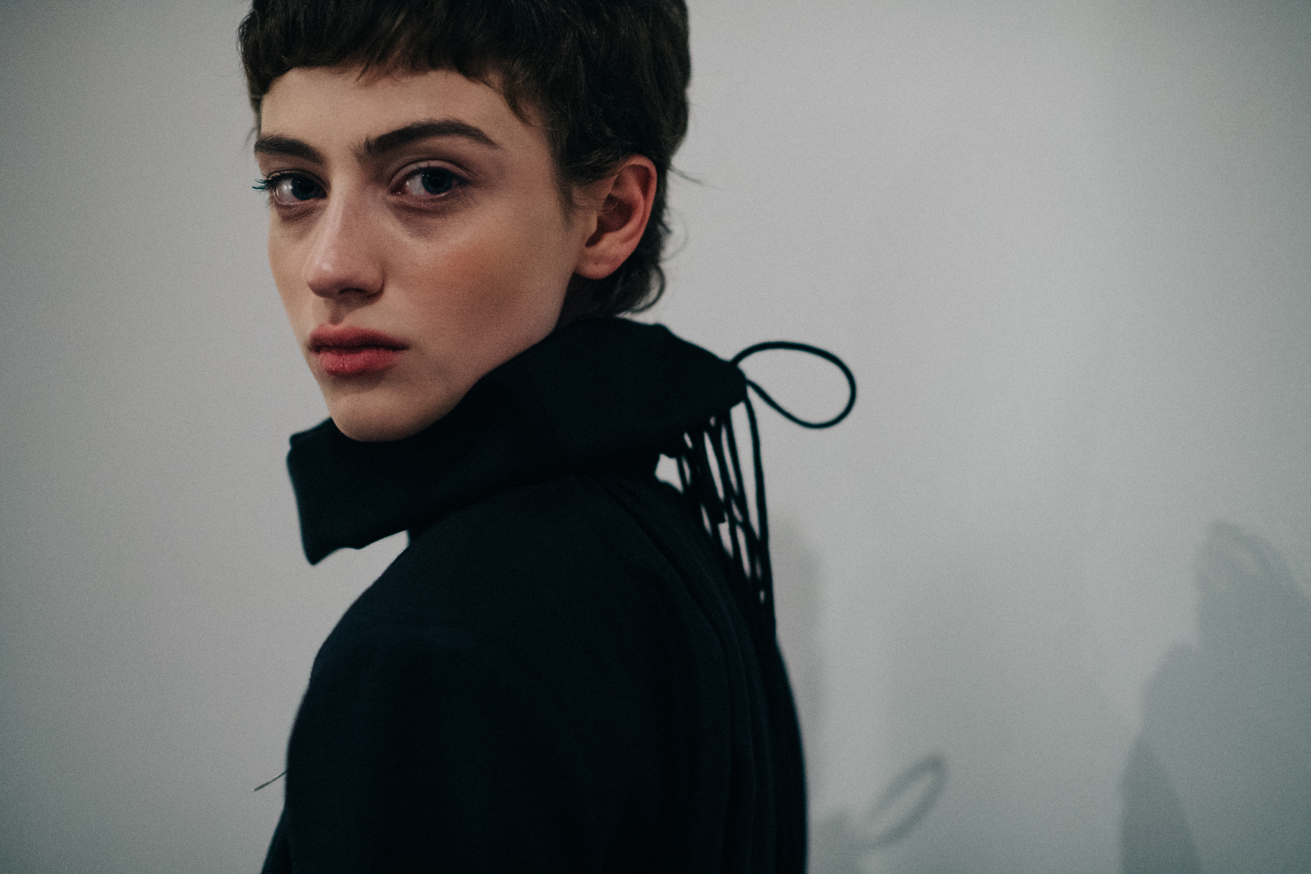 Model with black collar