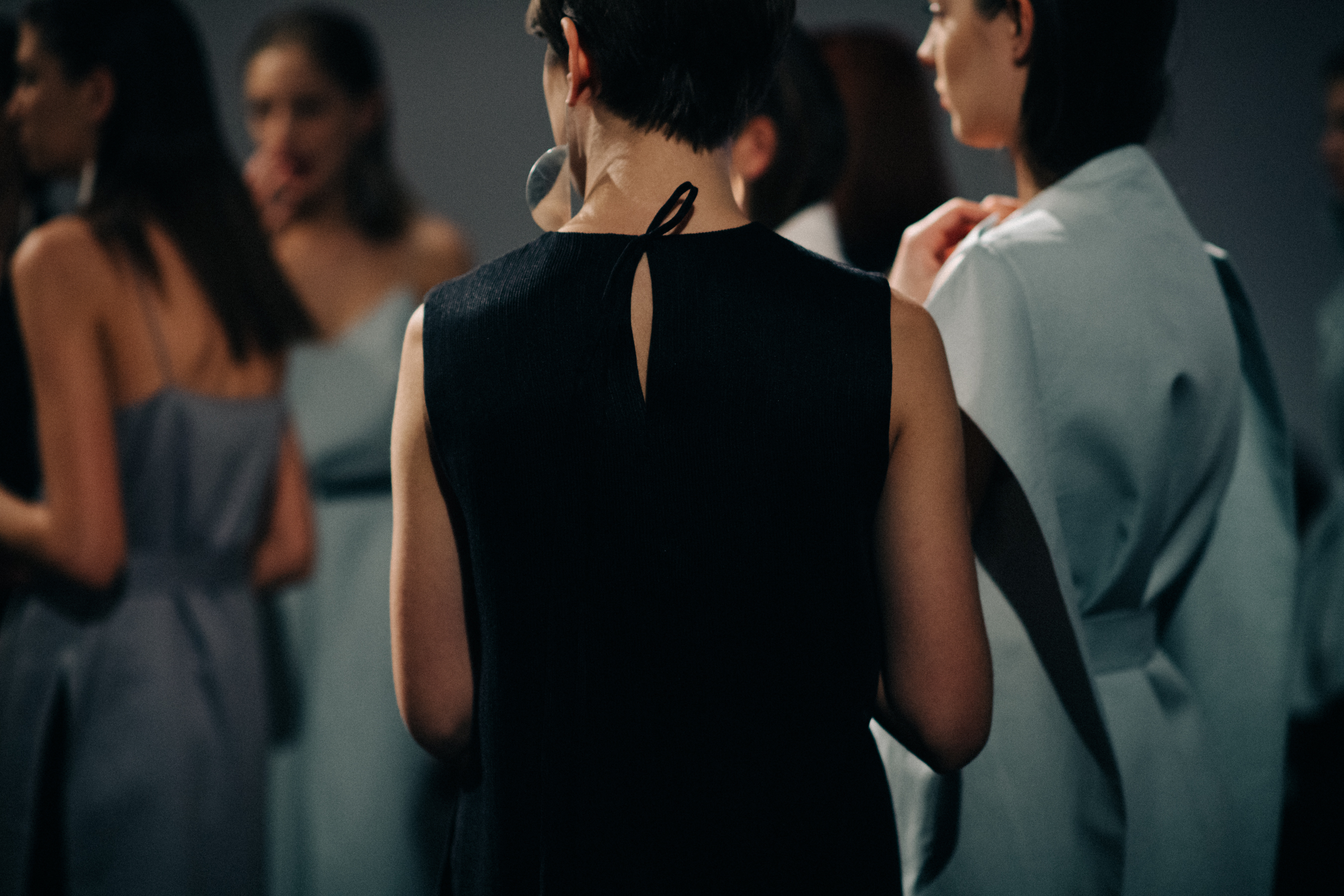 Model wearing black dress