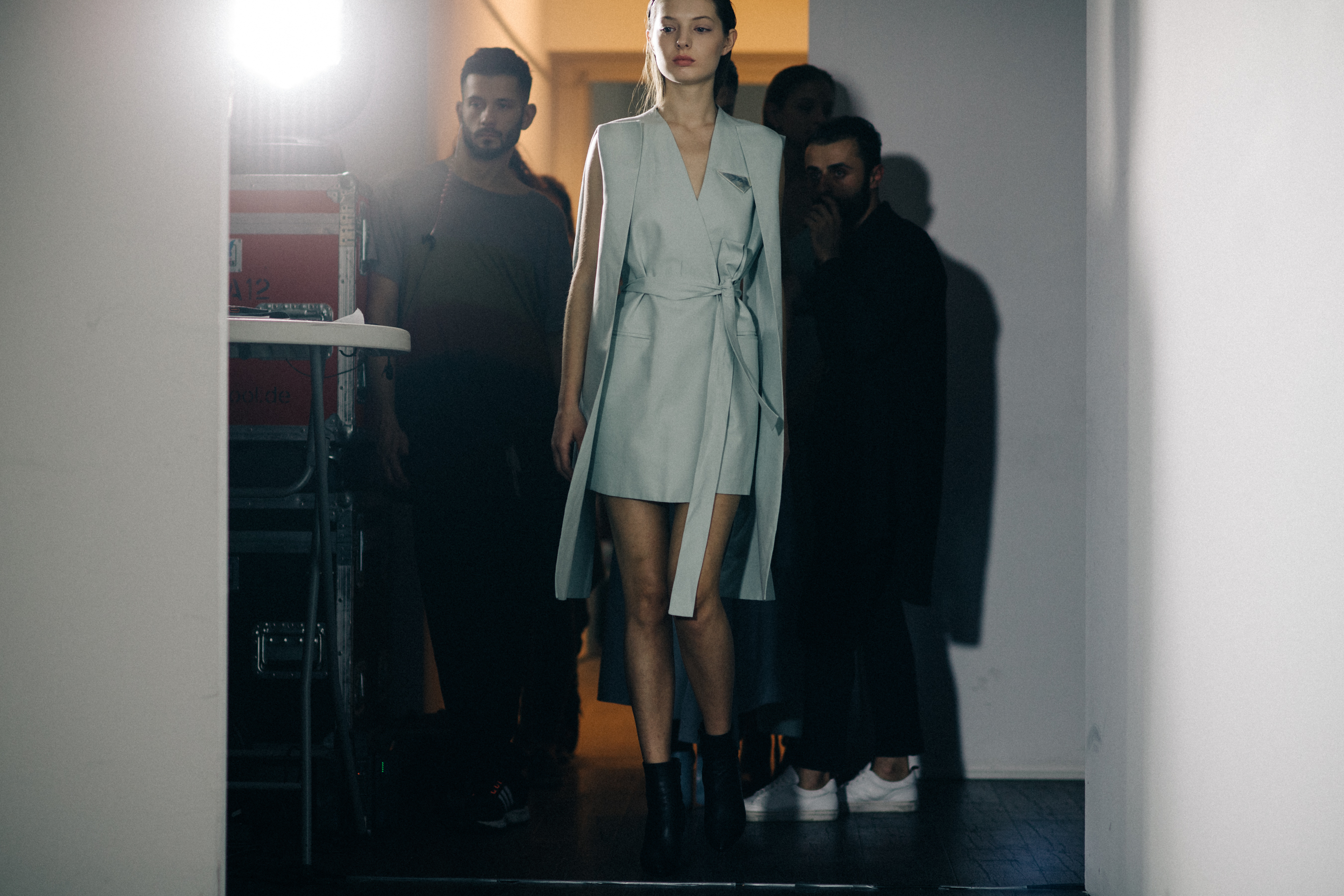 Model wearing grey dress