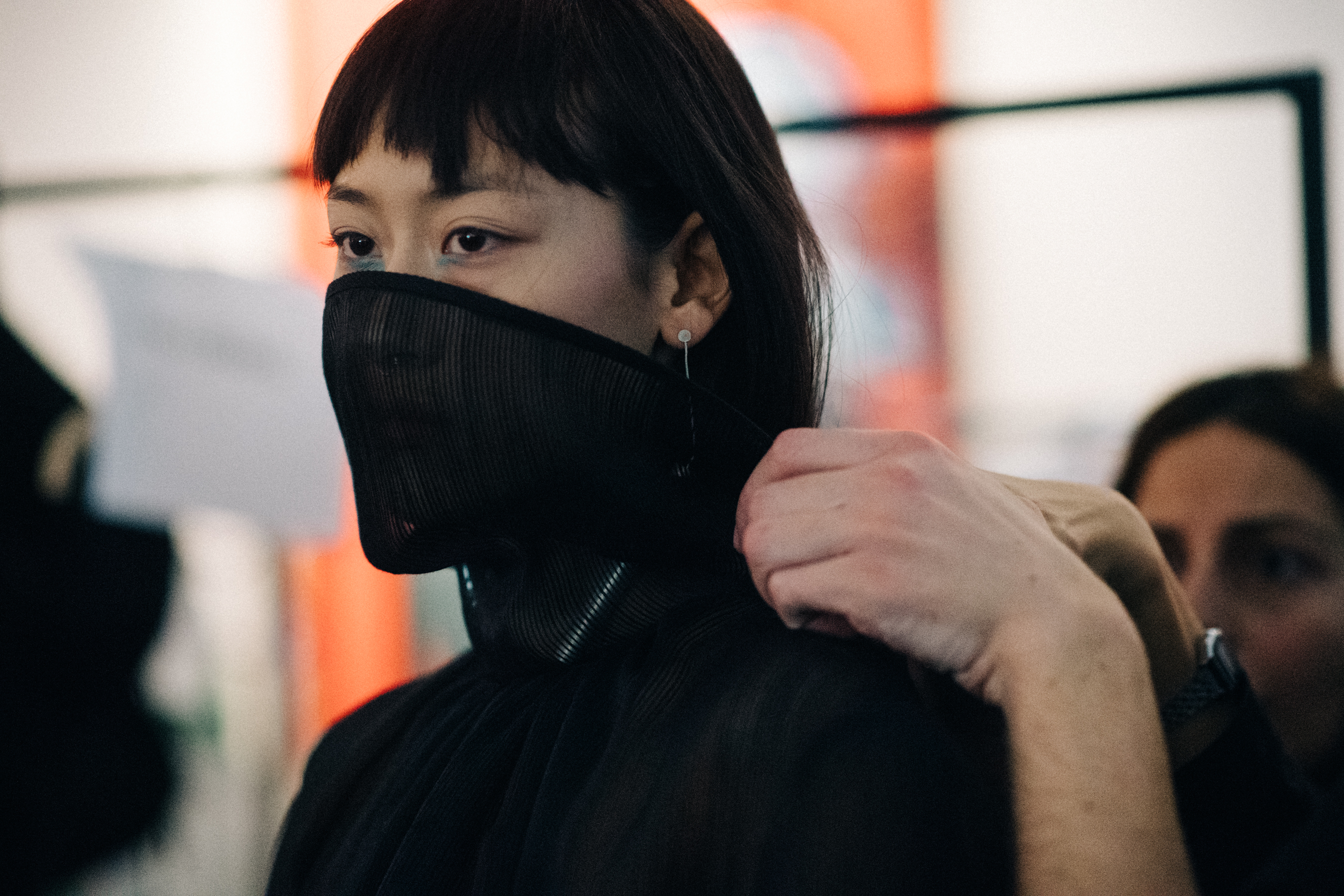 Model Nina Potshishvili covered herself face