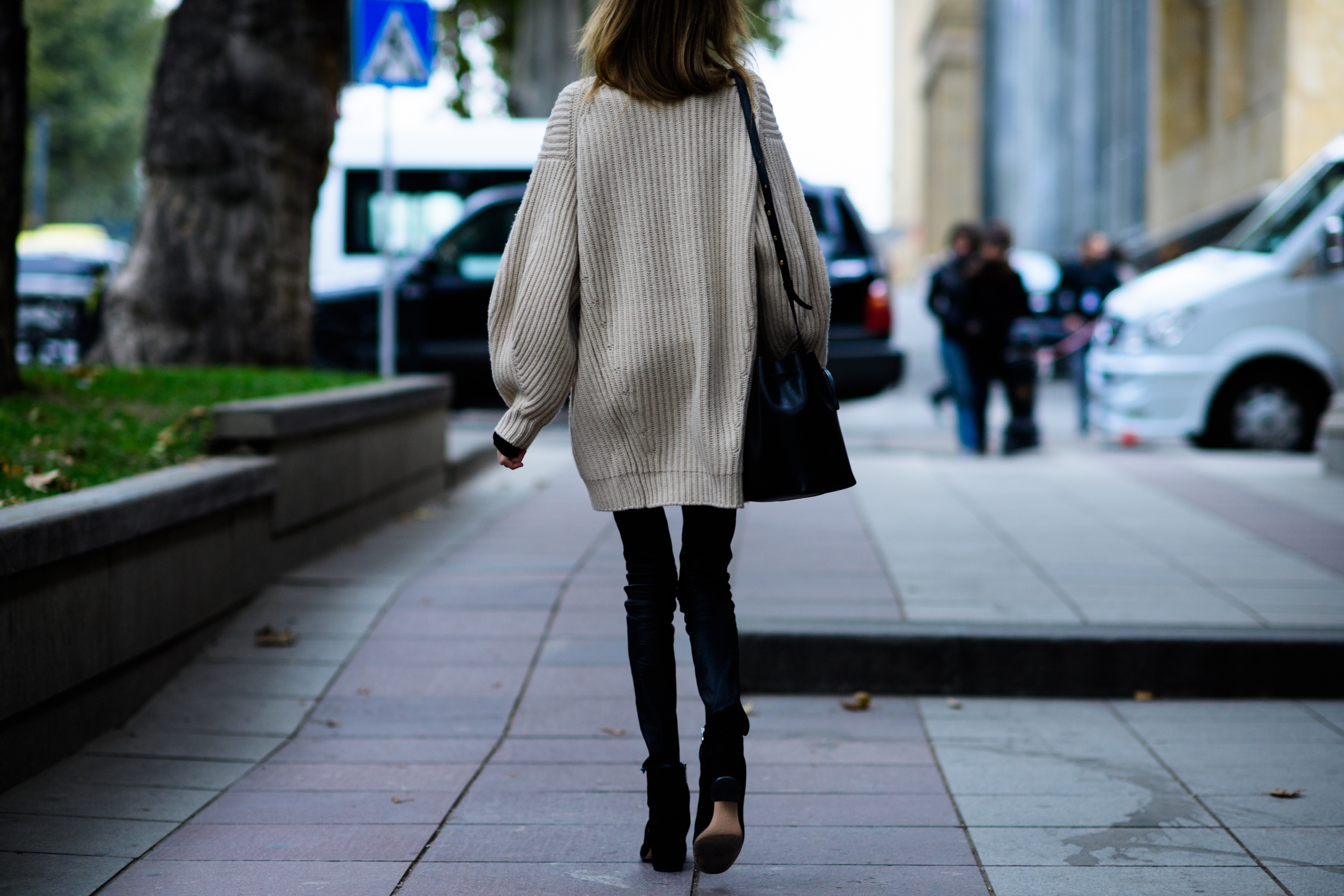Woman wearing long sweater