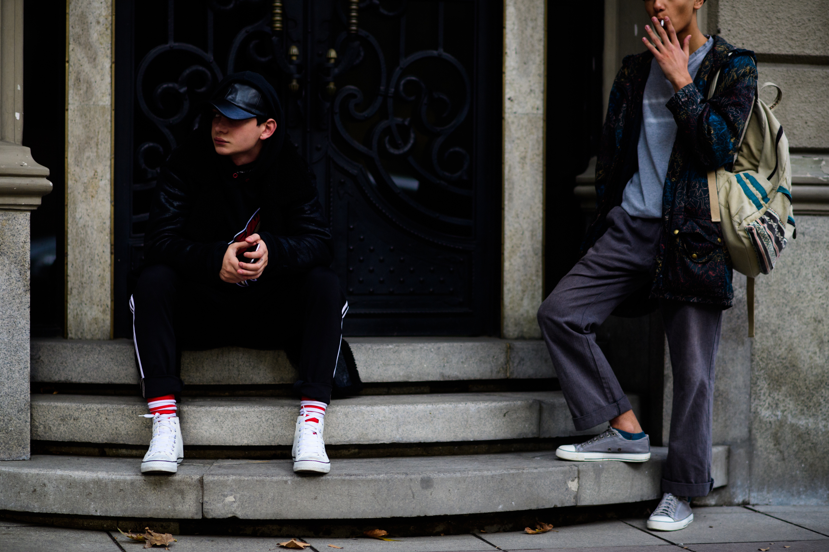 Two boys smoking after the show