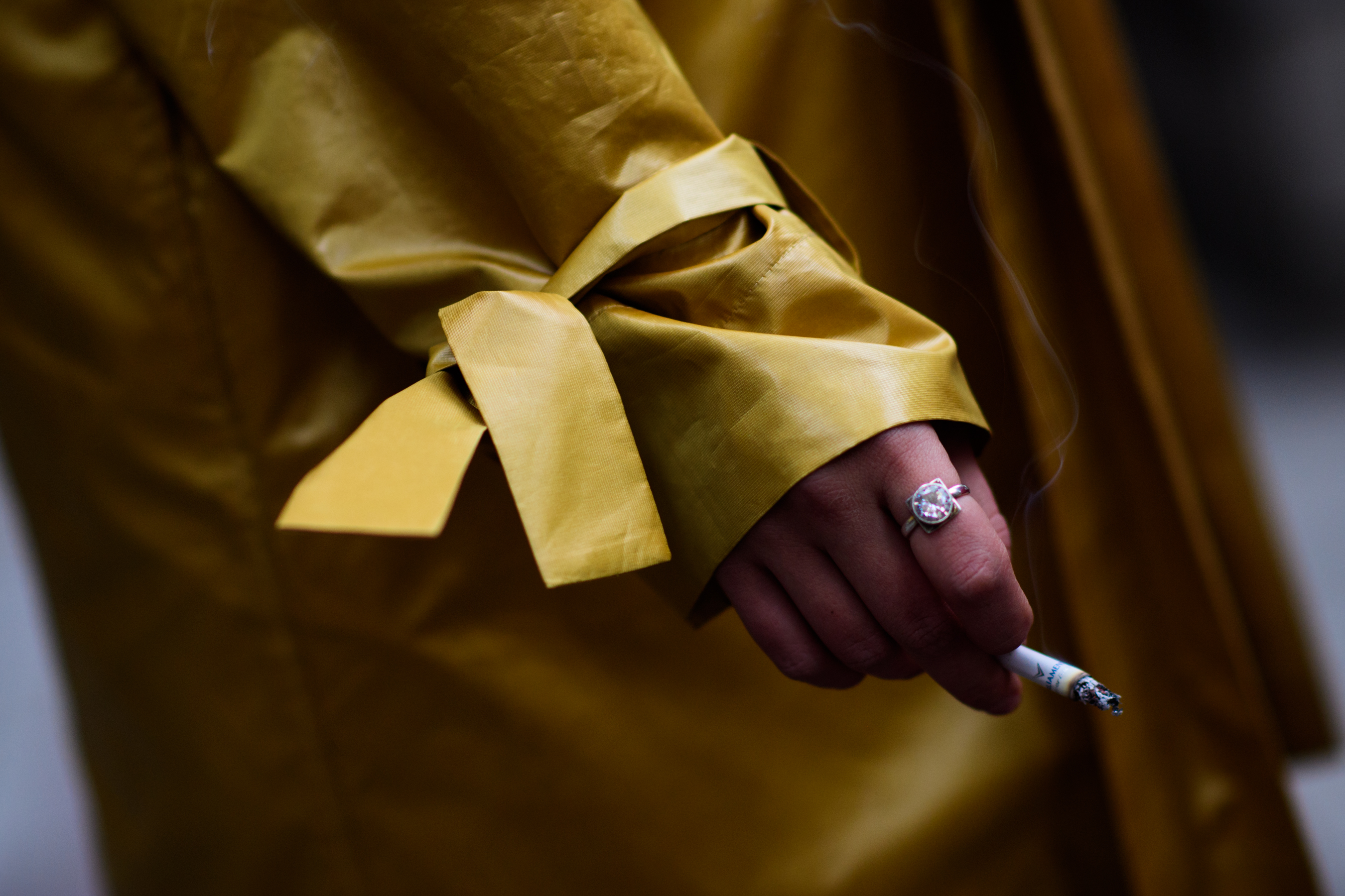 Woman wearing yellow coat