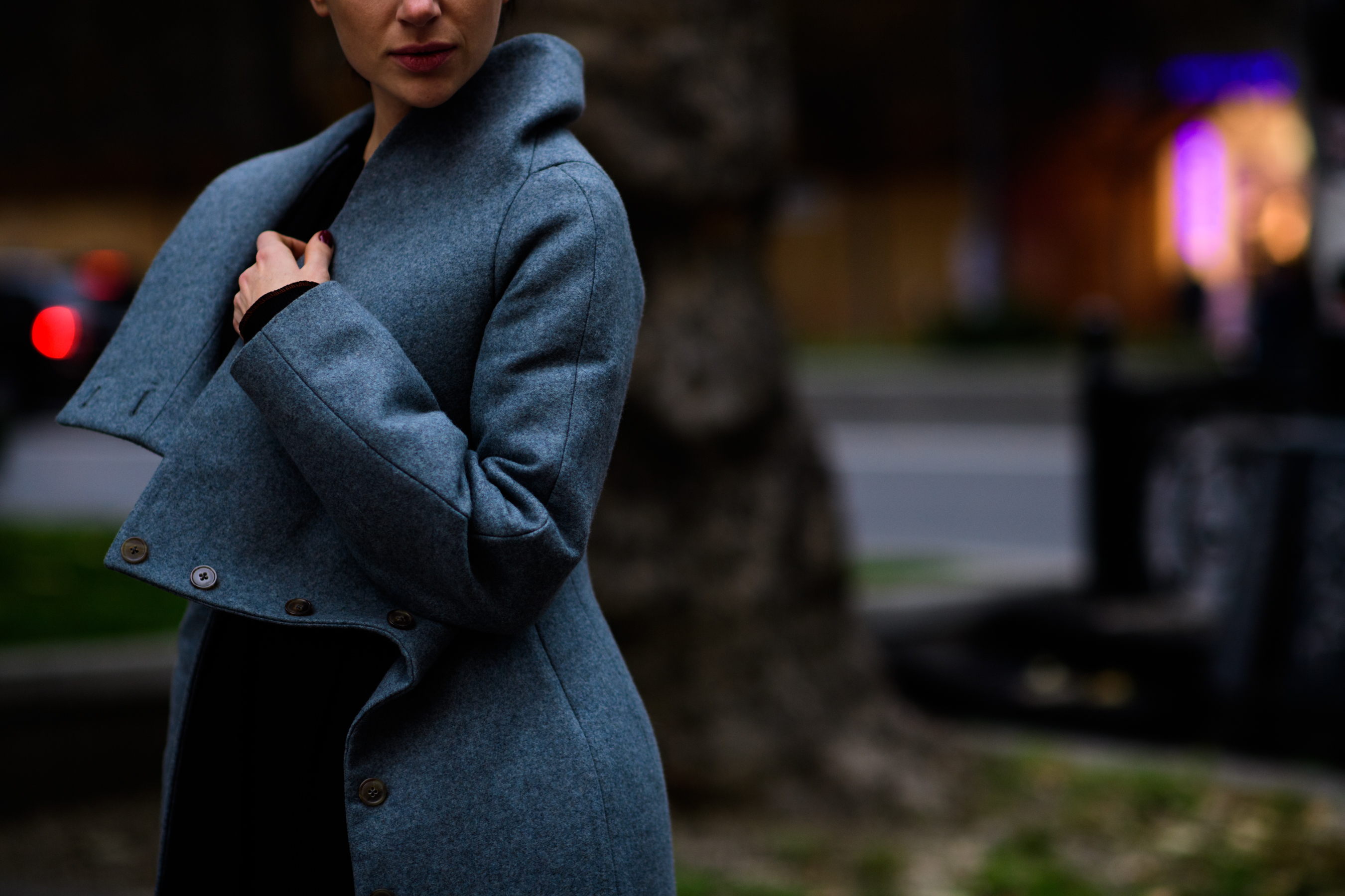Ukrainian designer wearing grey coat
