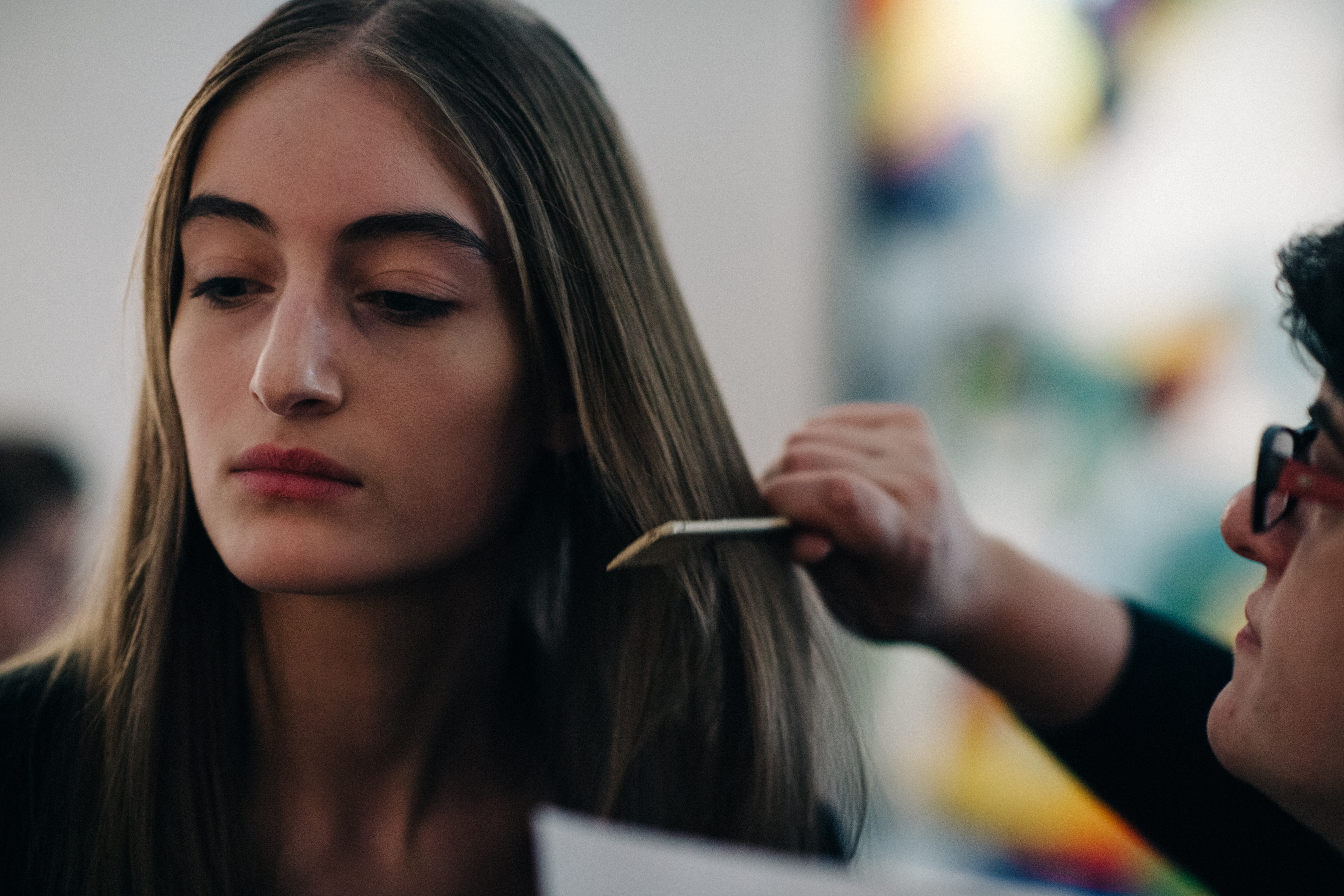 Model preparing hair