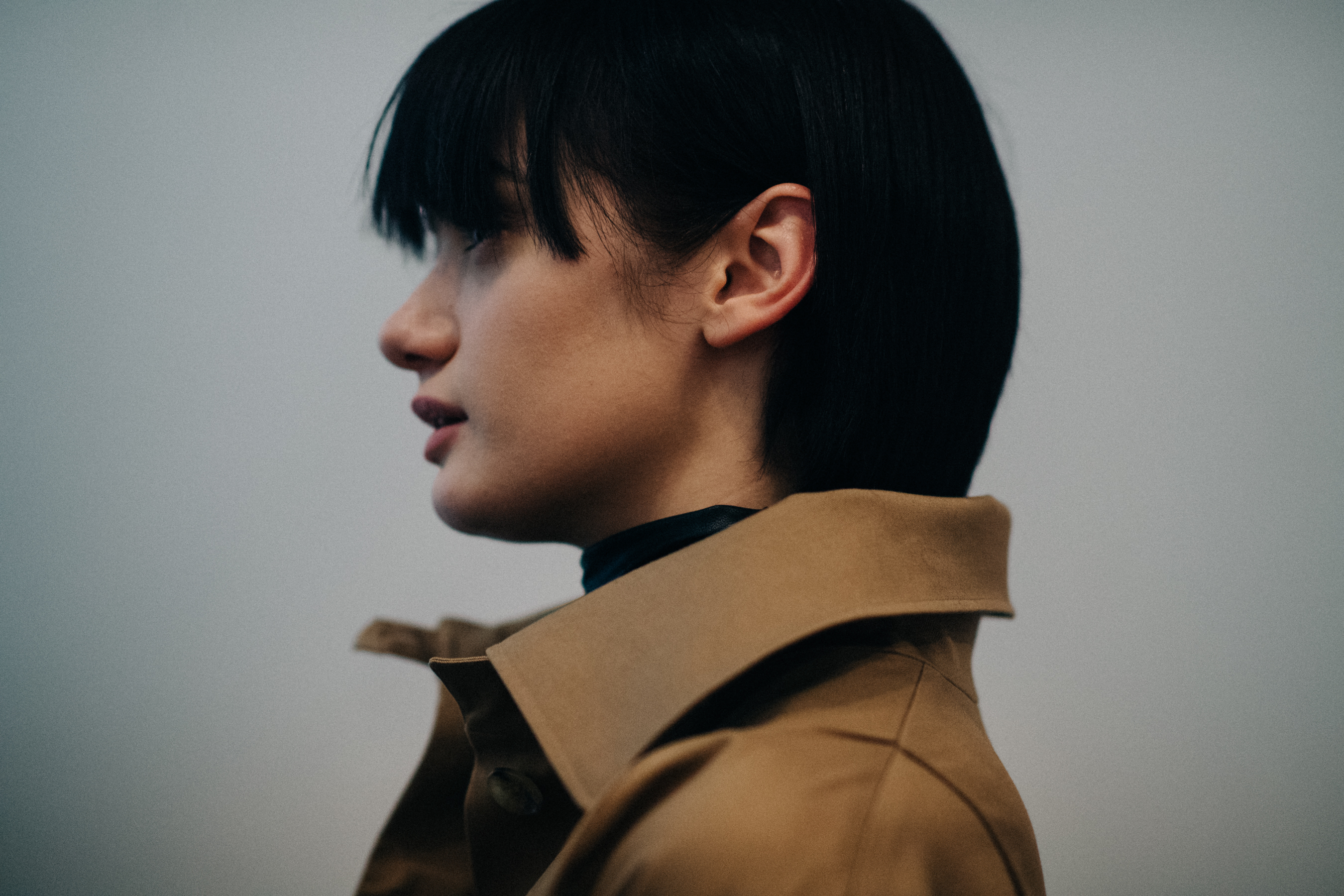 Model wearing cloak