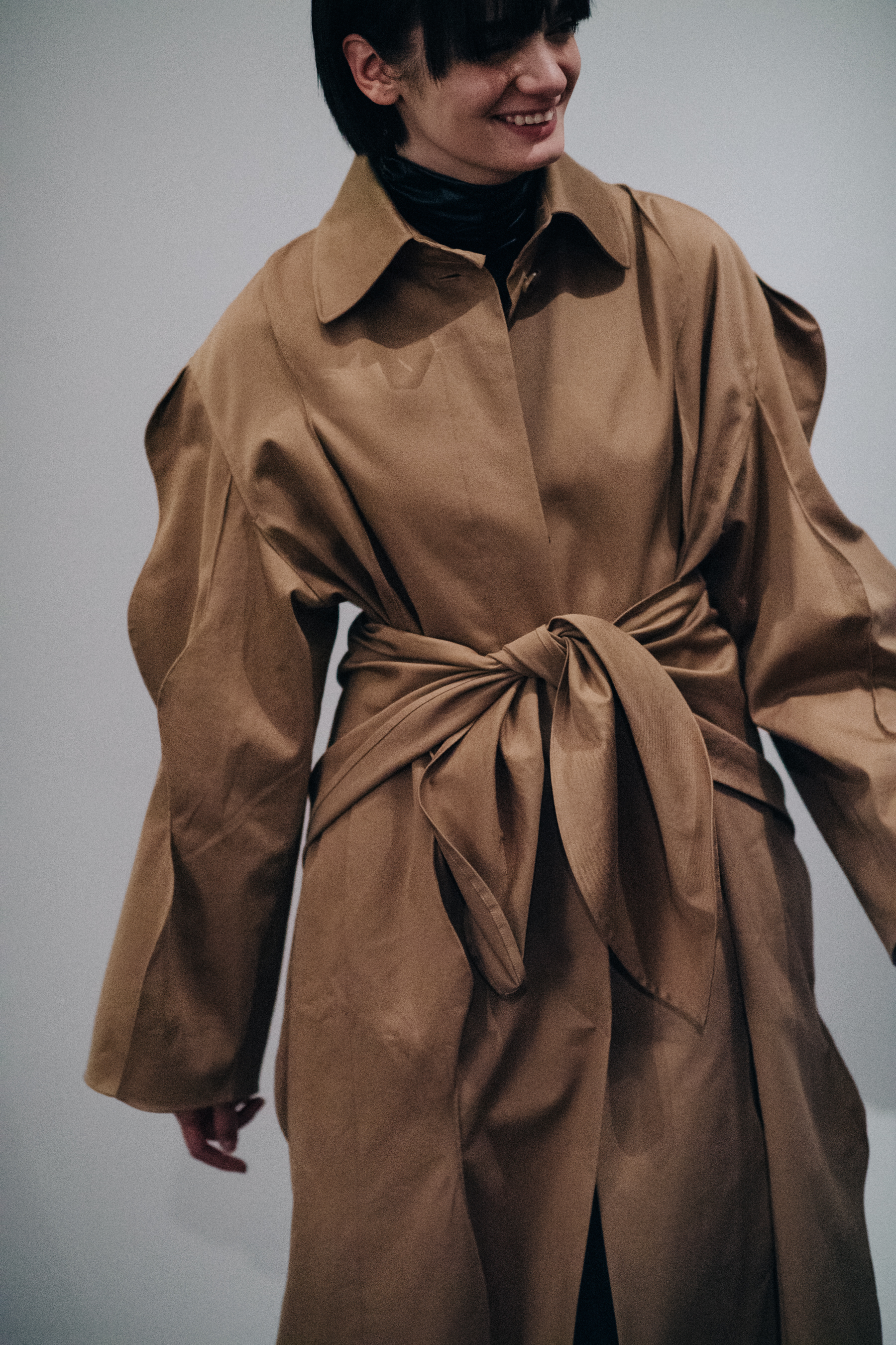 Model wearing cloak