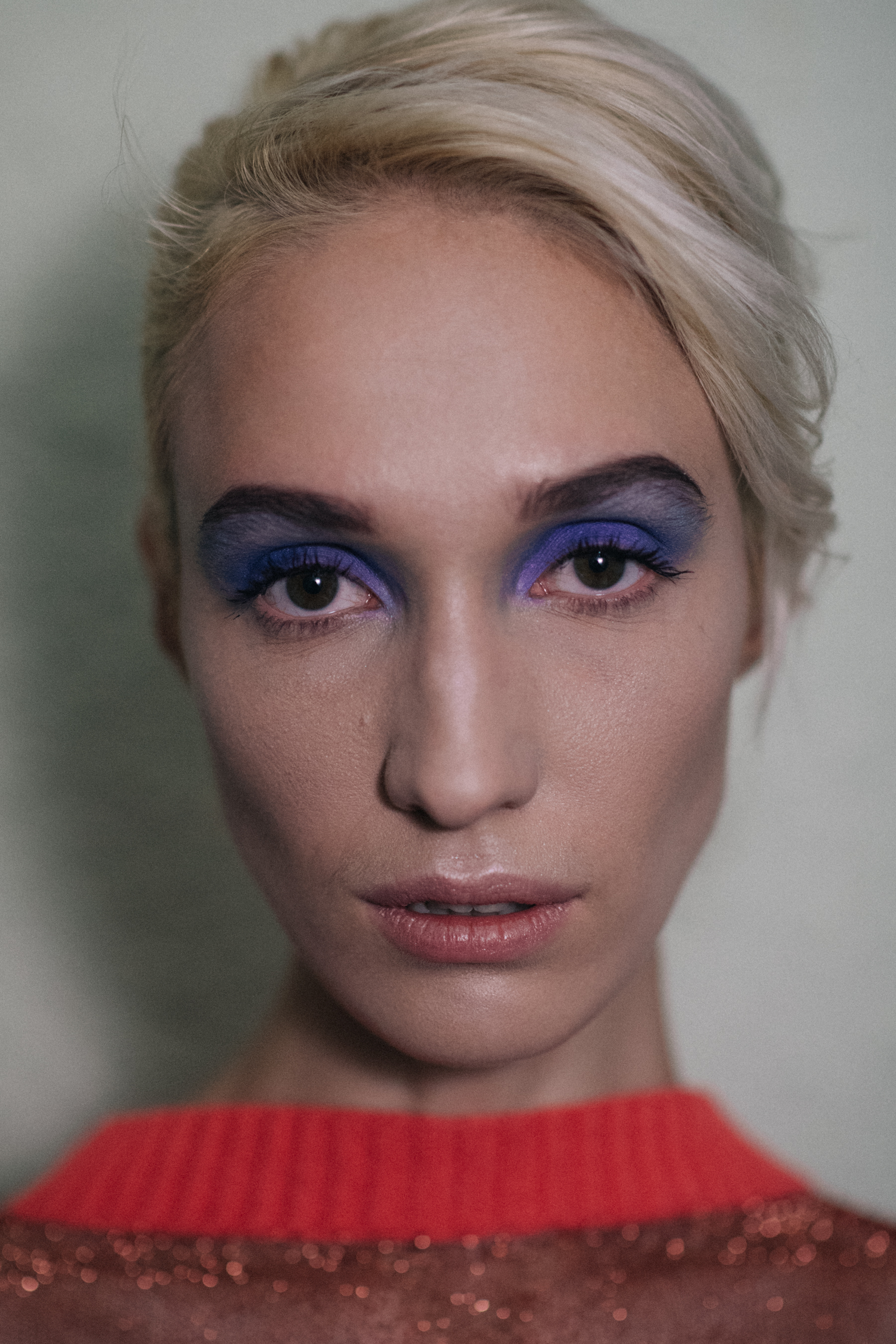 Portrait of Ukrainian model with violet makeup