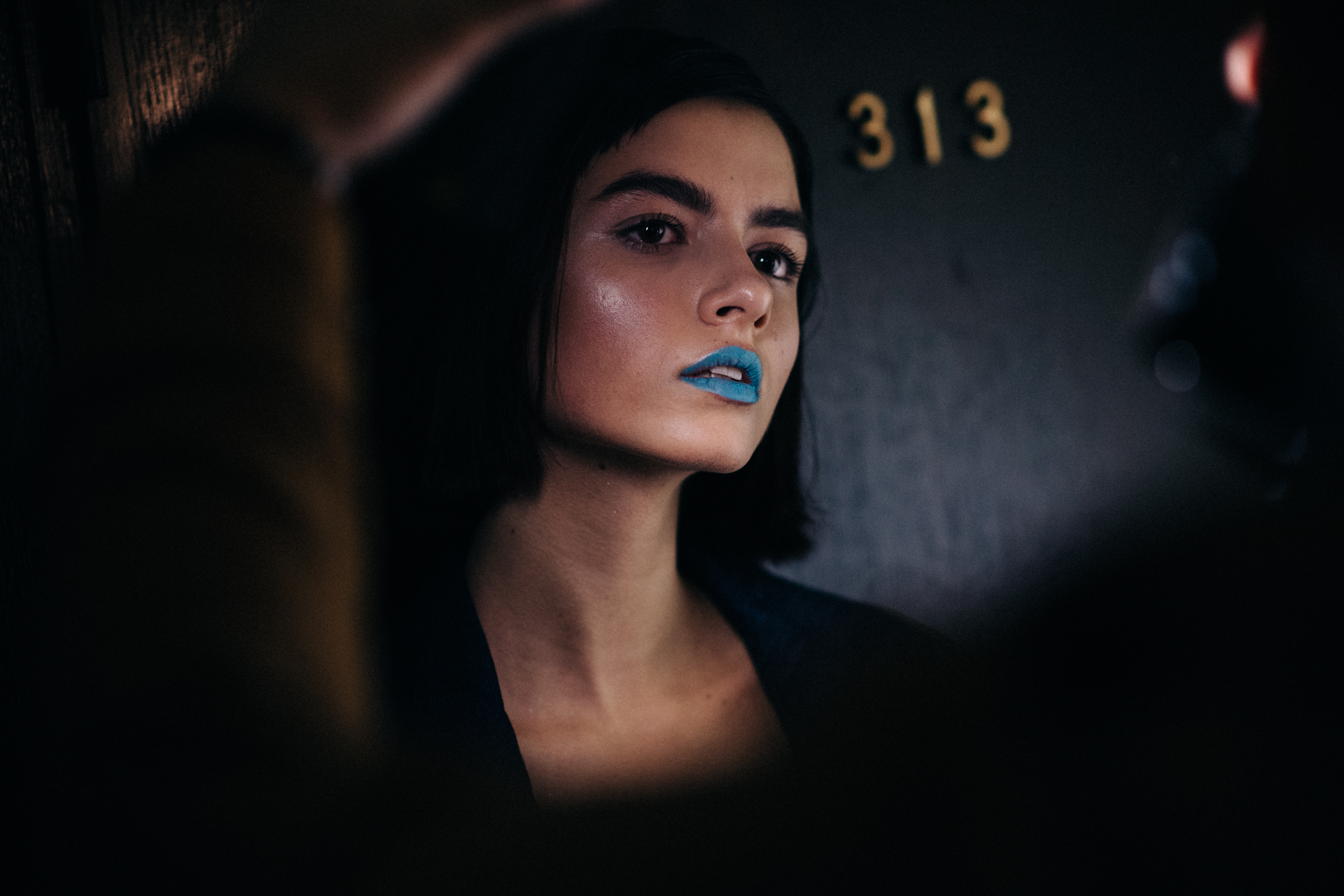 Model wearing blue lipstick