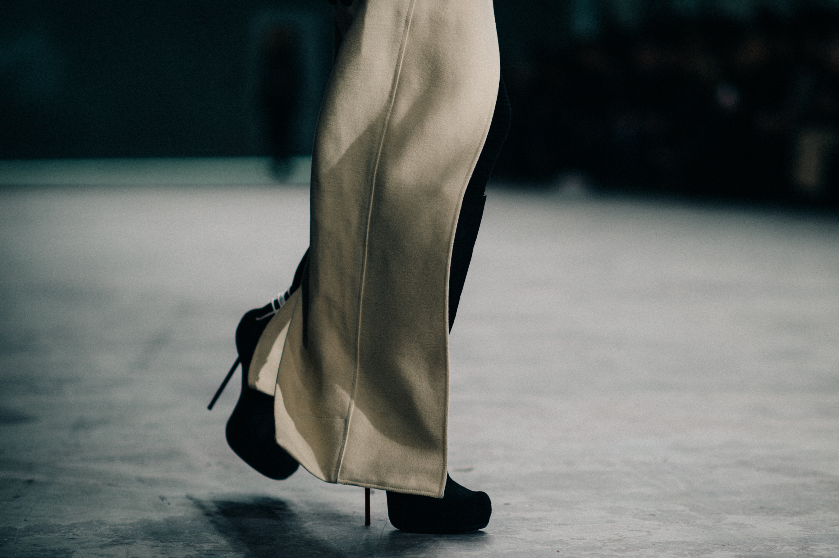 Model wearing black stiletto boots