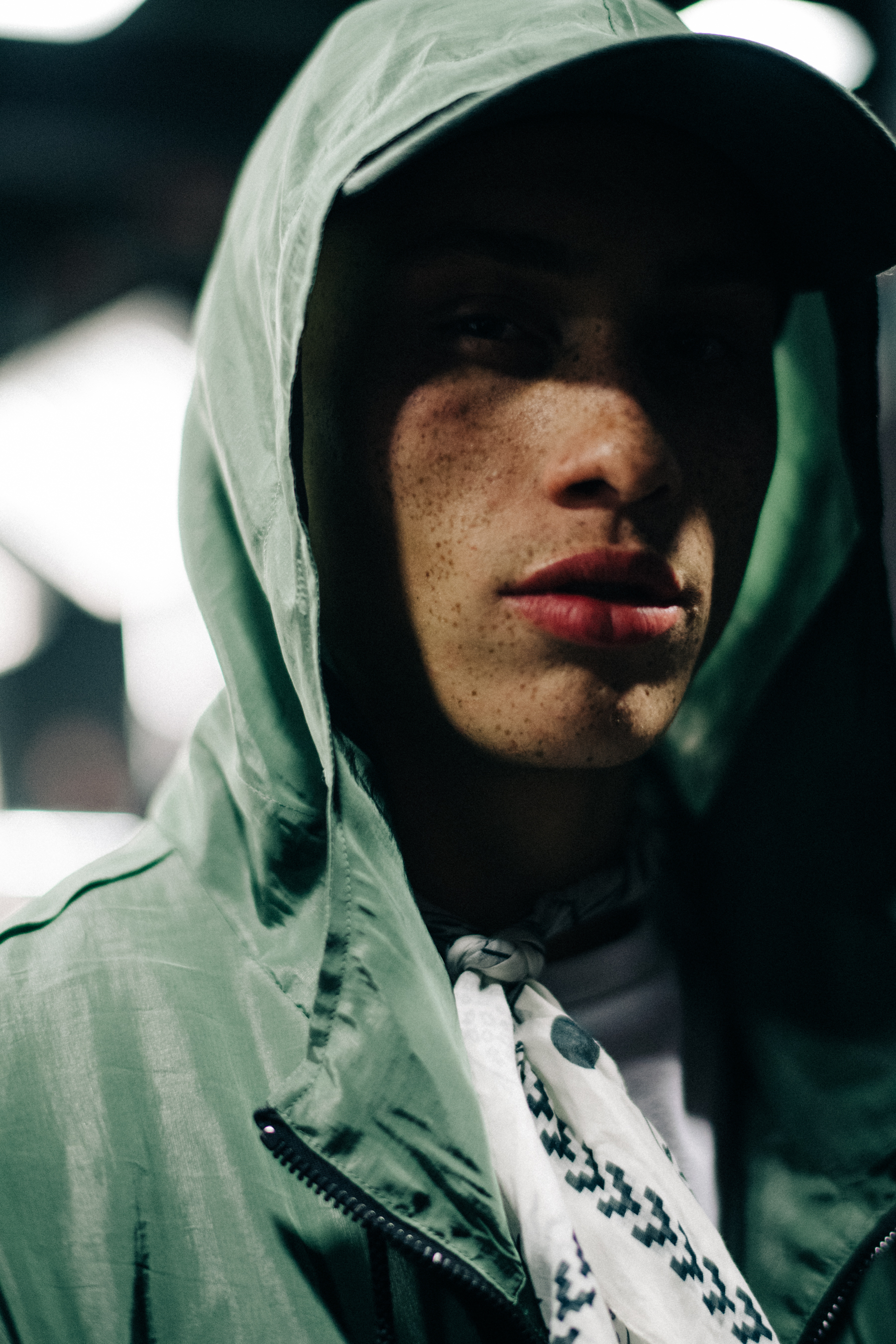 Man wearing green clothes