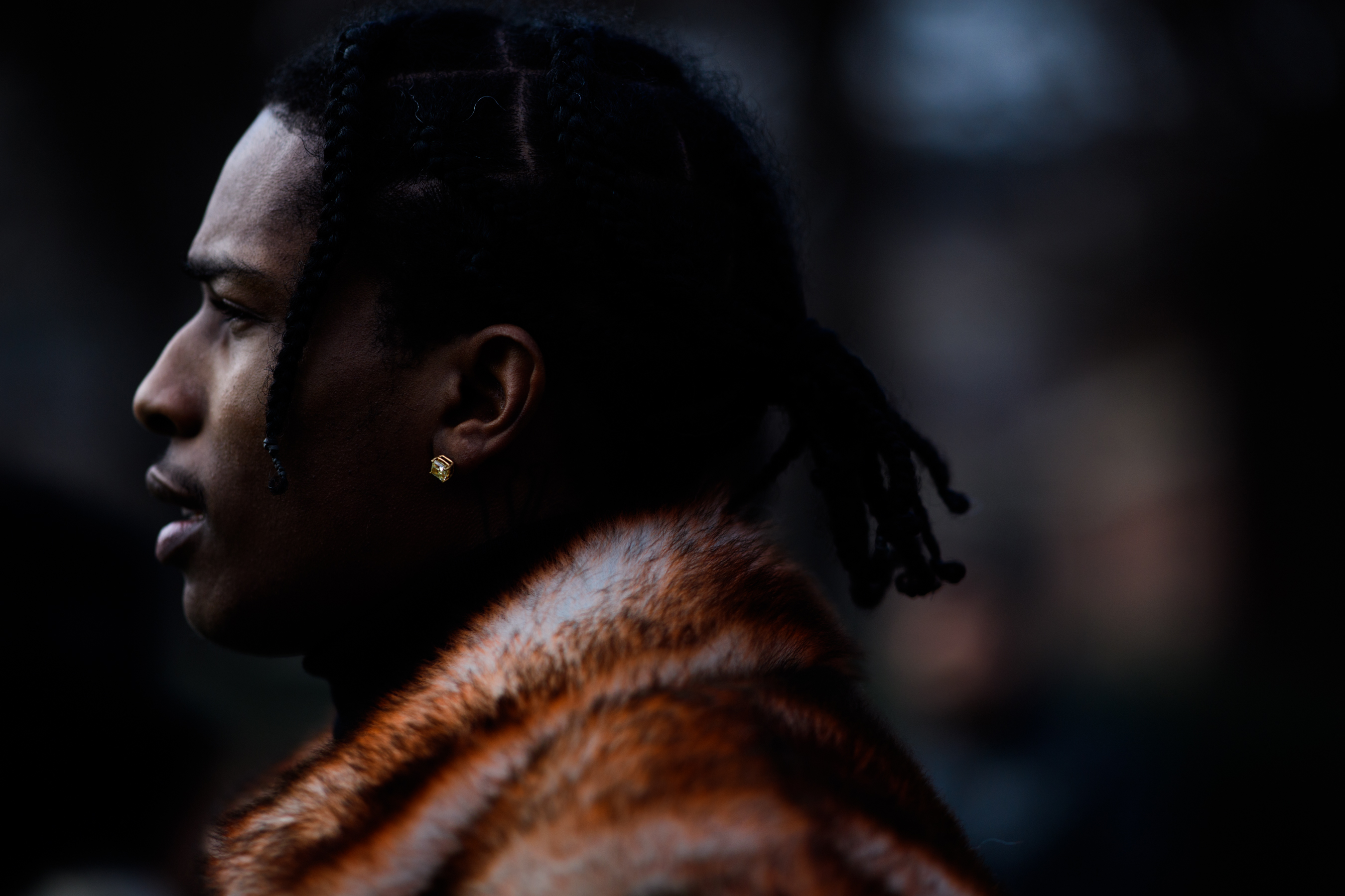 African man wearing furry coat