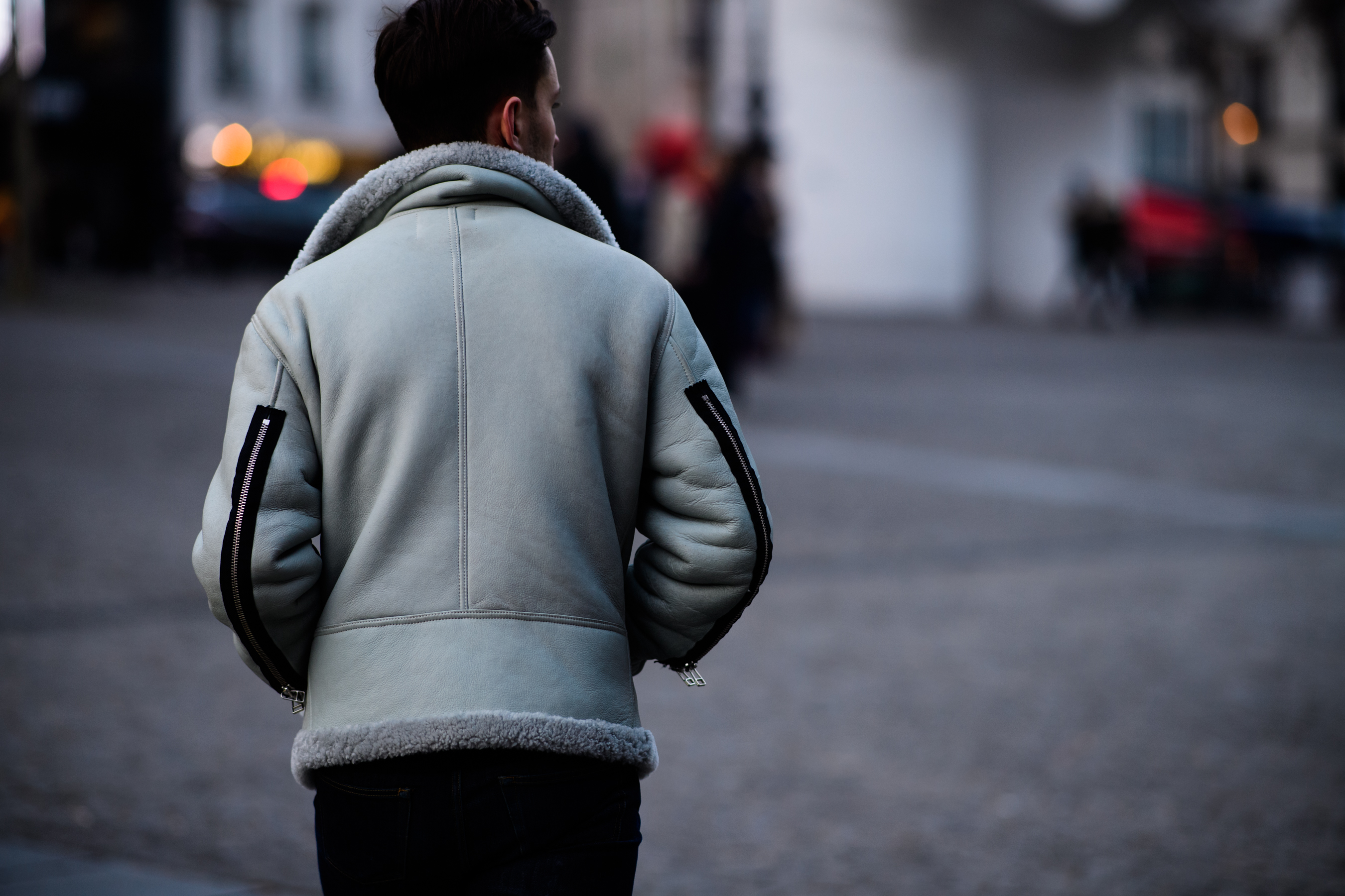 Man wearing grey coat