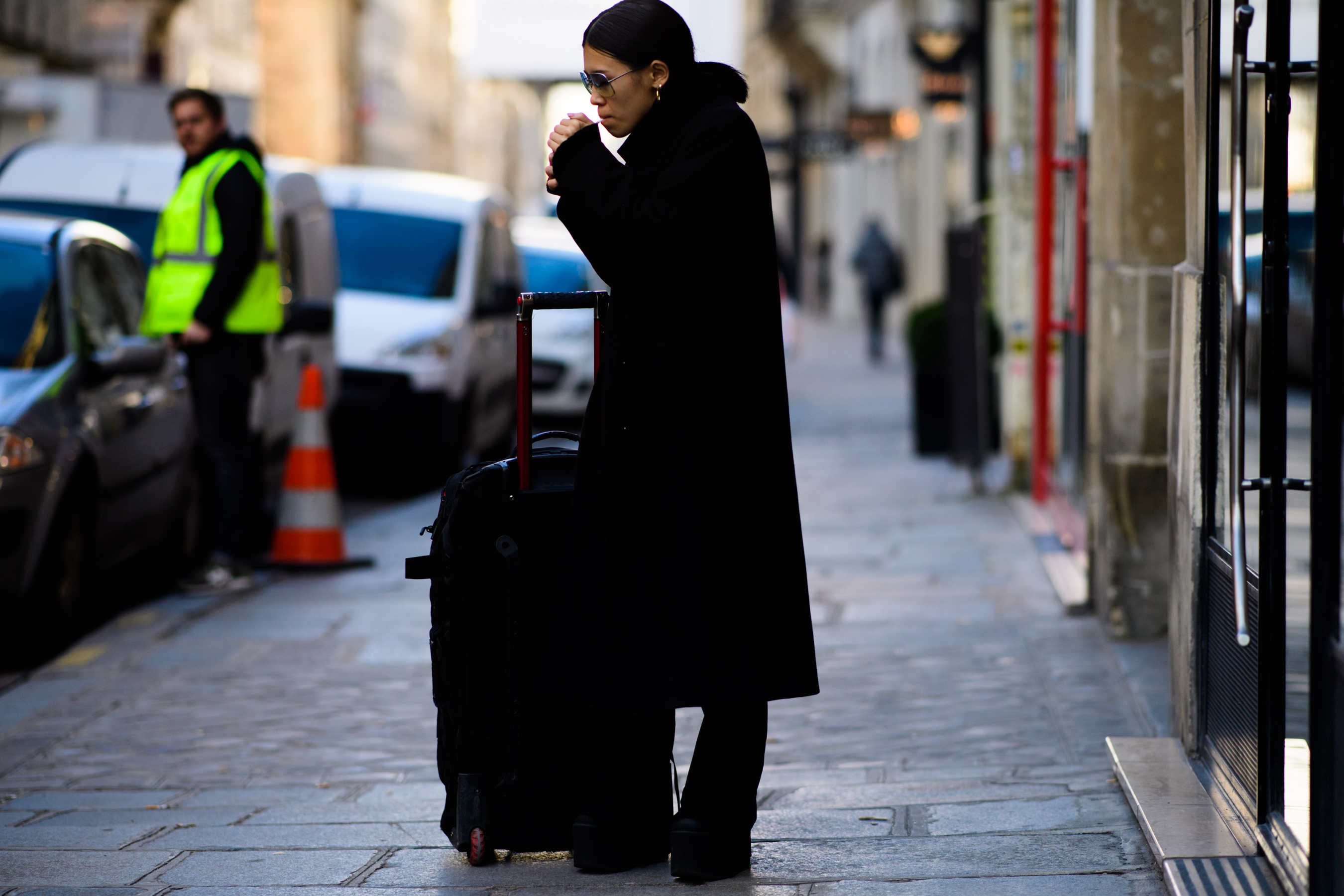 Woman wearing black coat