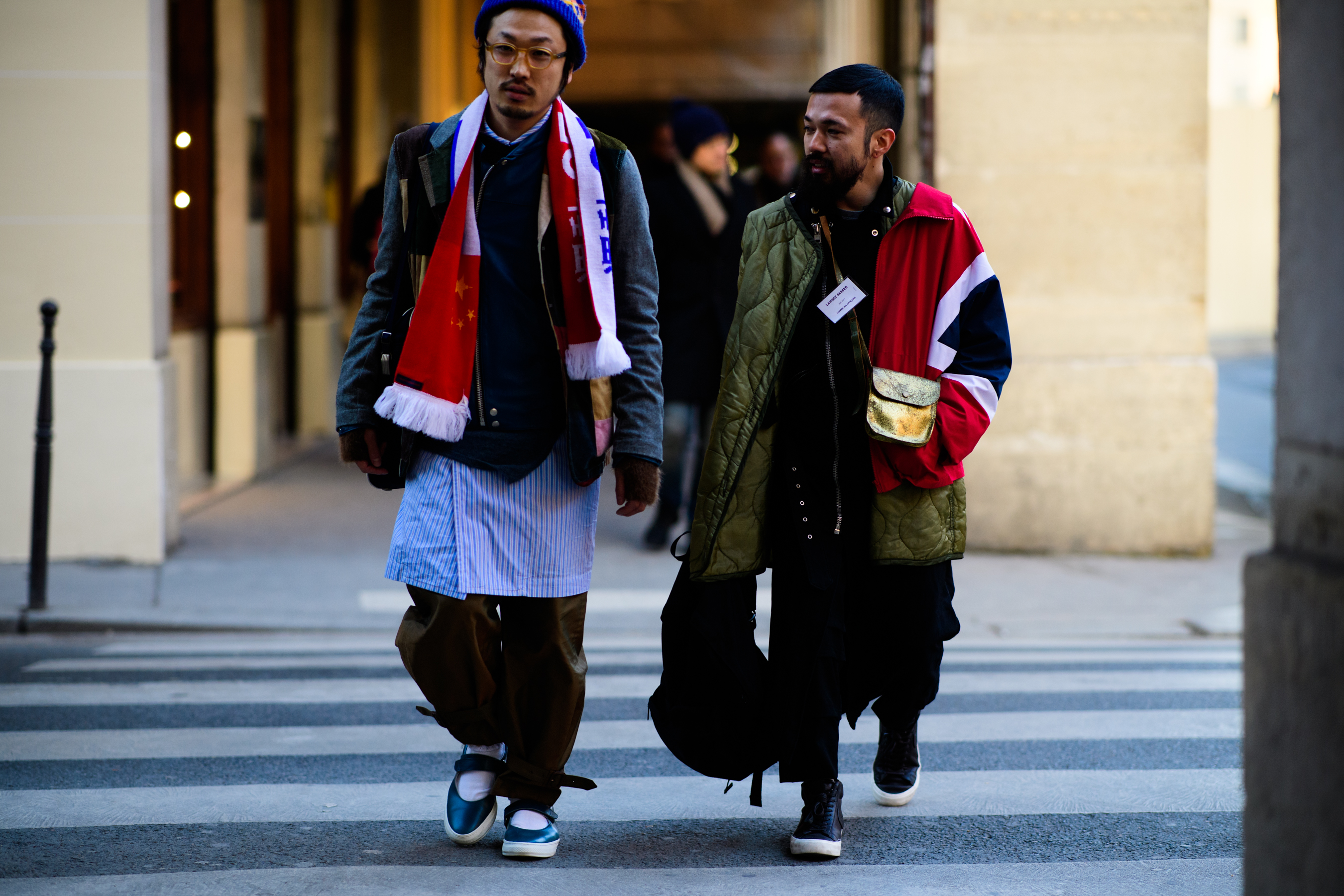 Asian men wearing layers of clothes