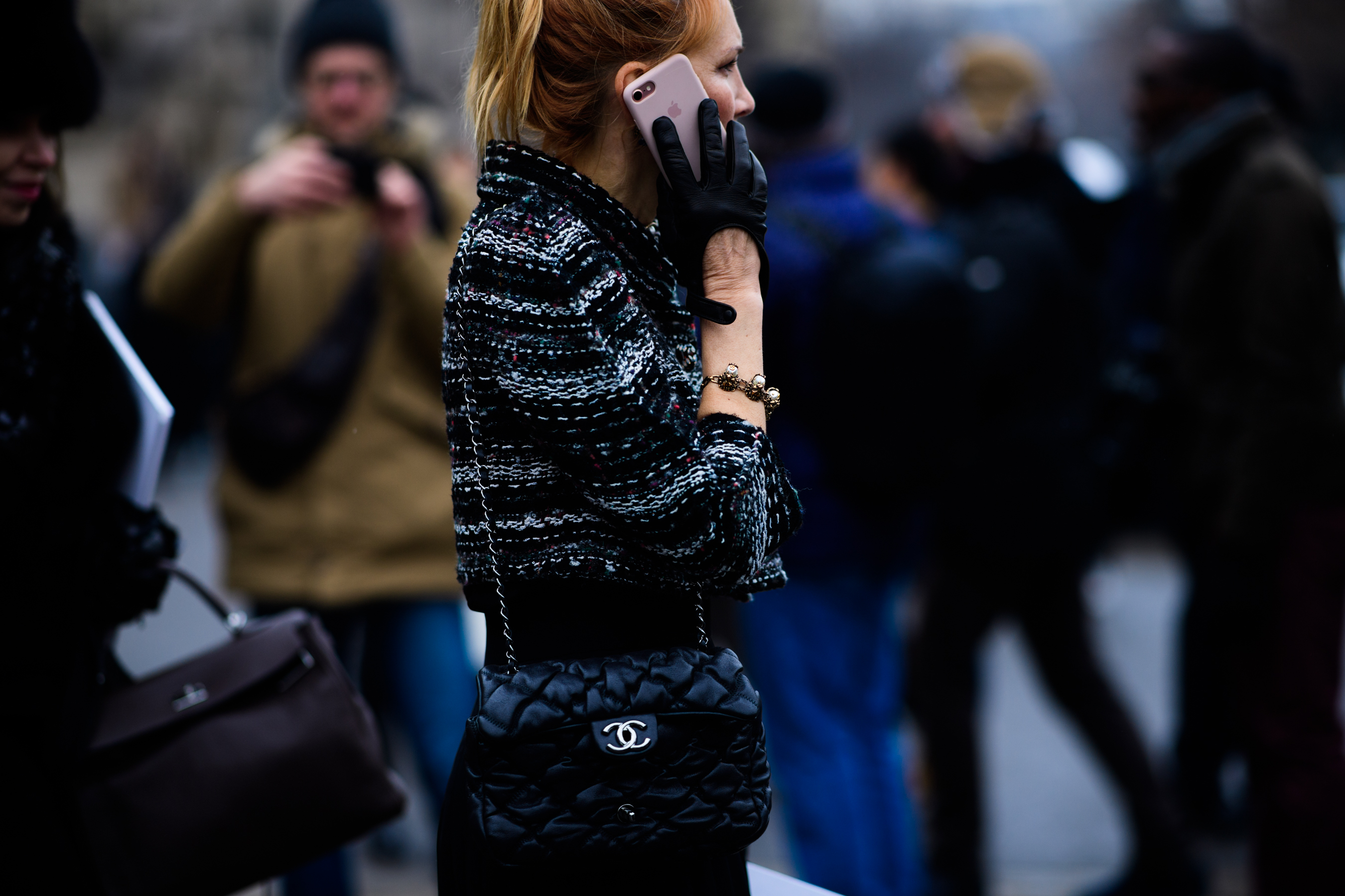 Woman wearing Chanel handbag