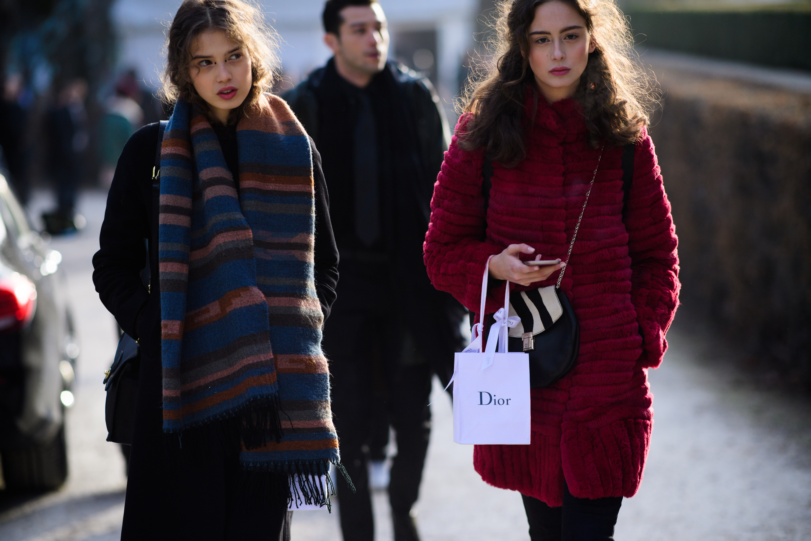 Model with dior paper bag