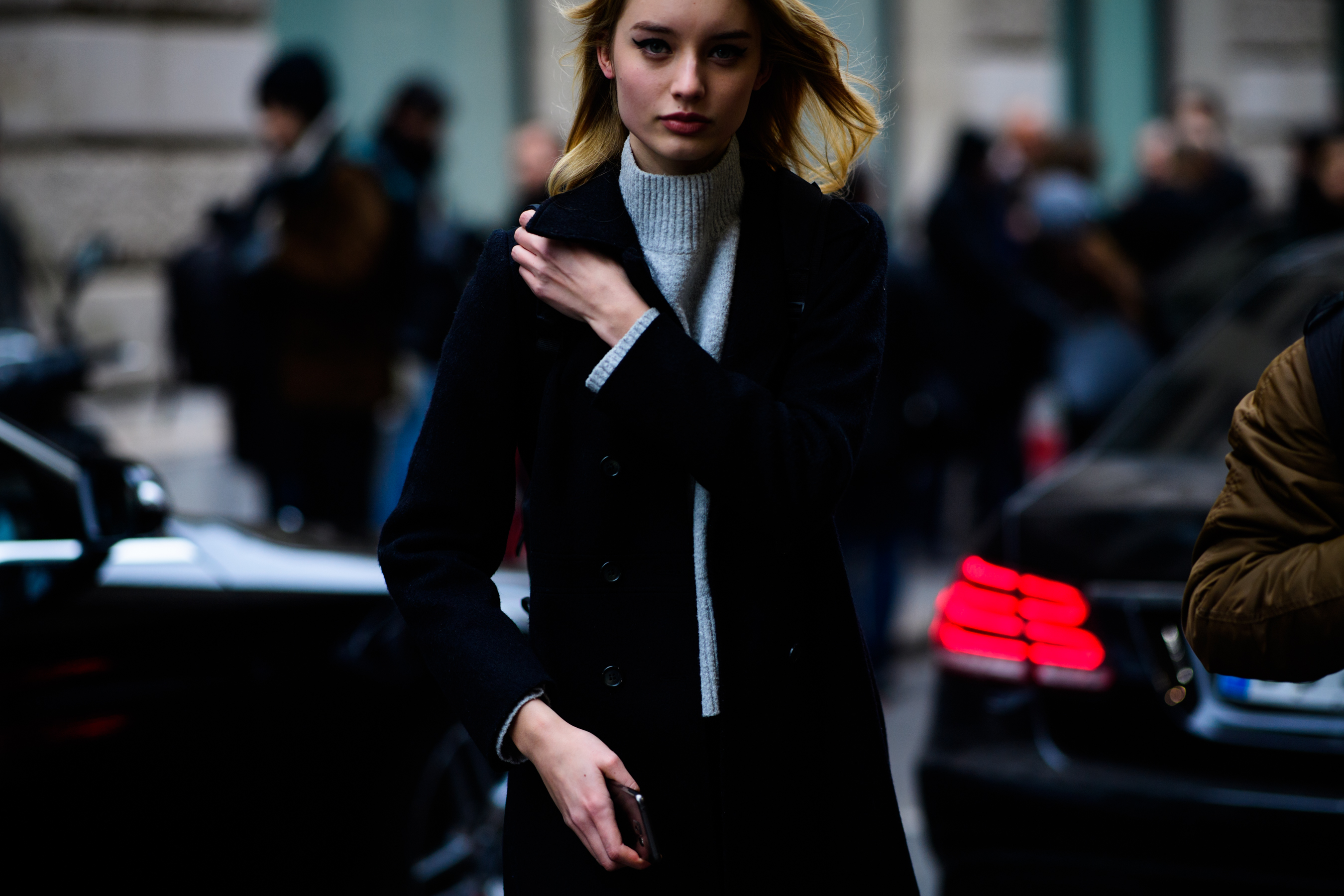 Woman wearing black coat