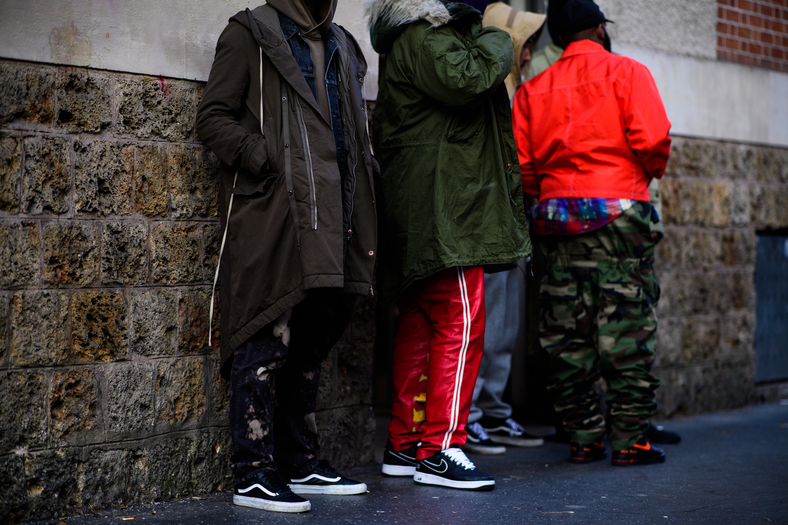 Men wearing vans and nike shoes