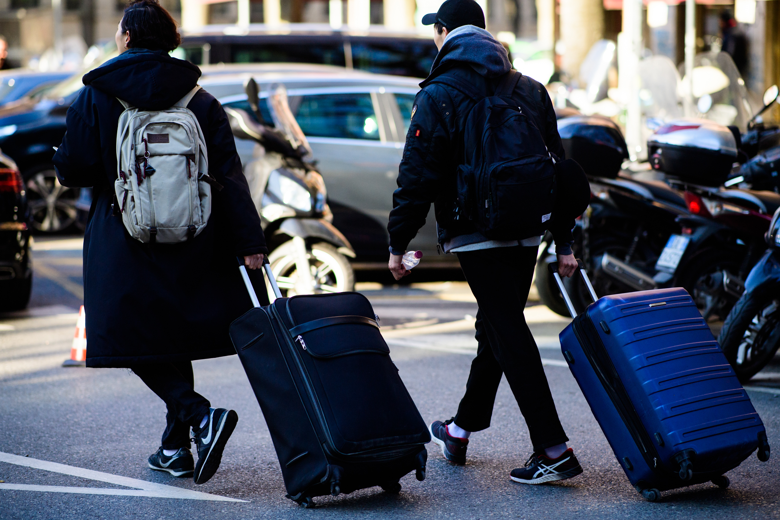 People with suitcases after the show
