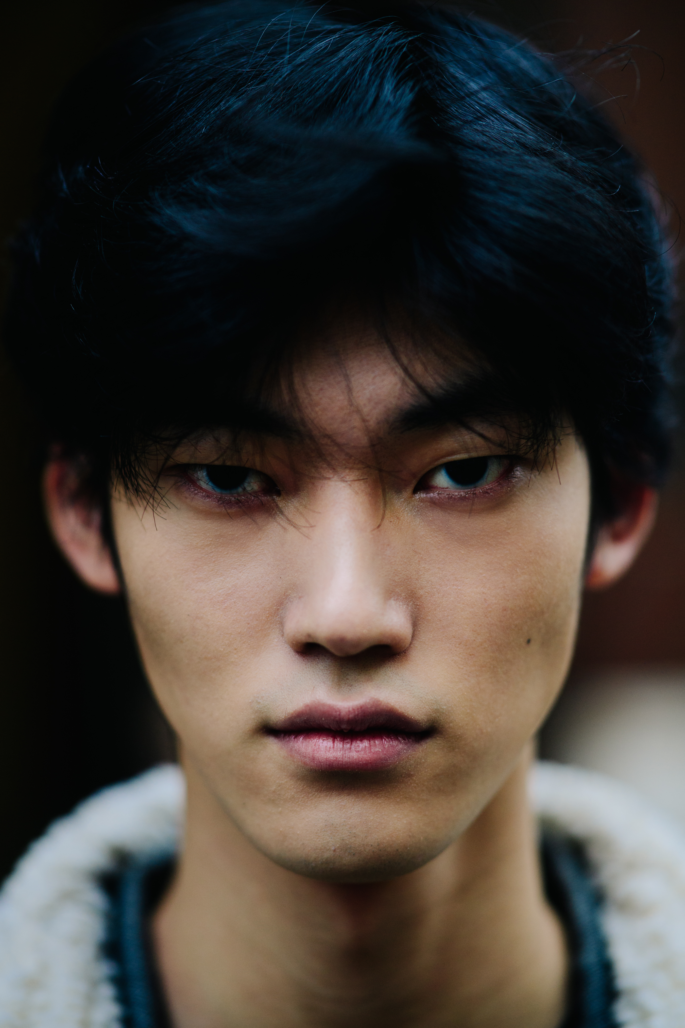 Asian male model after the show