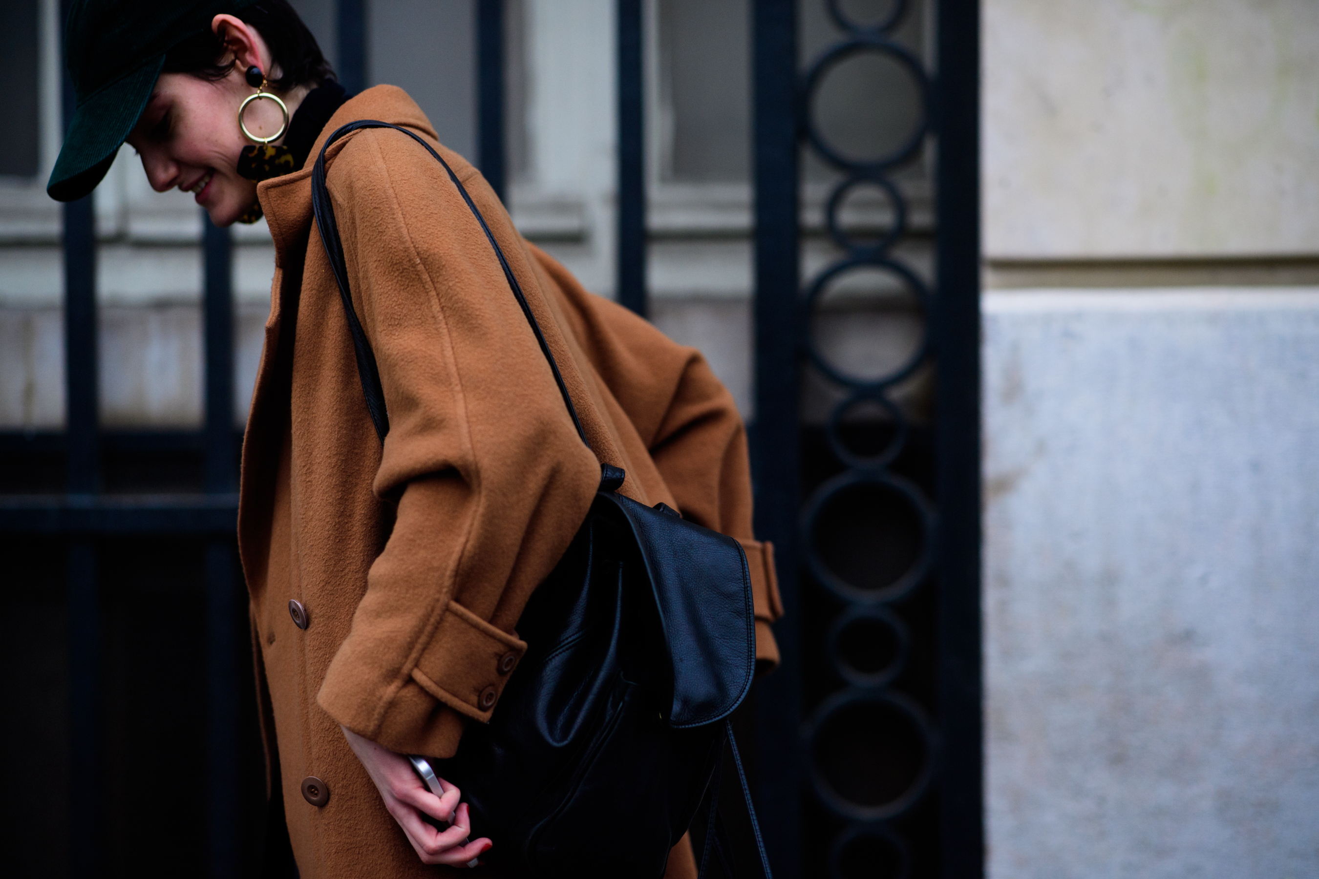 Woman wearing brown coat
