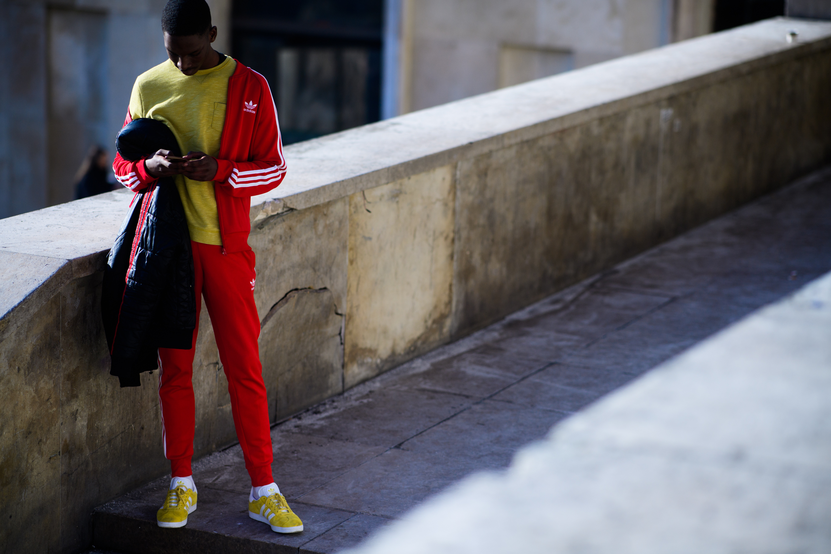 Man wering adidas clothes