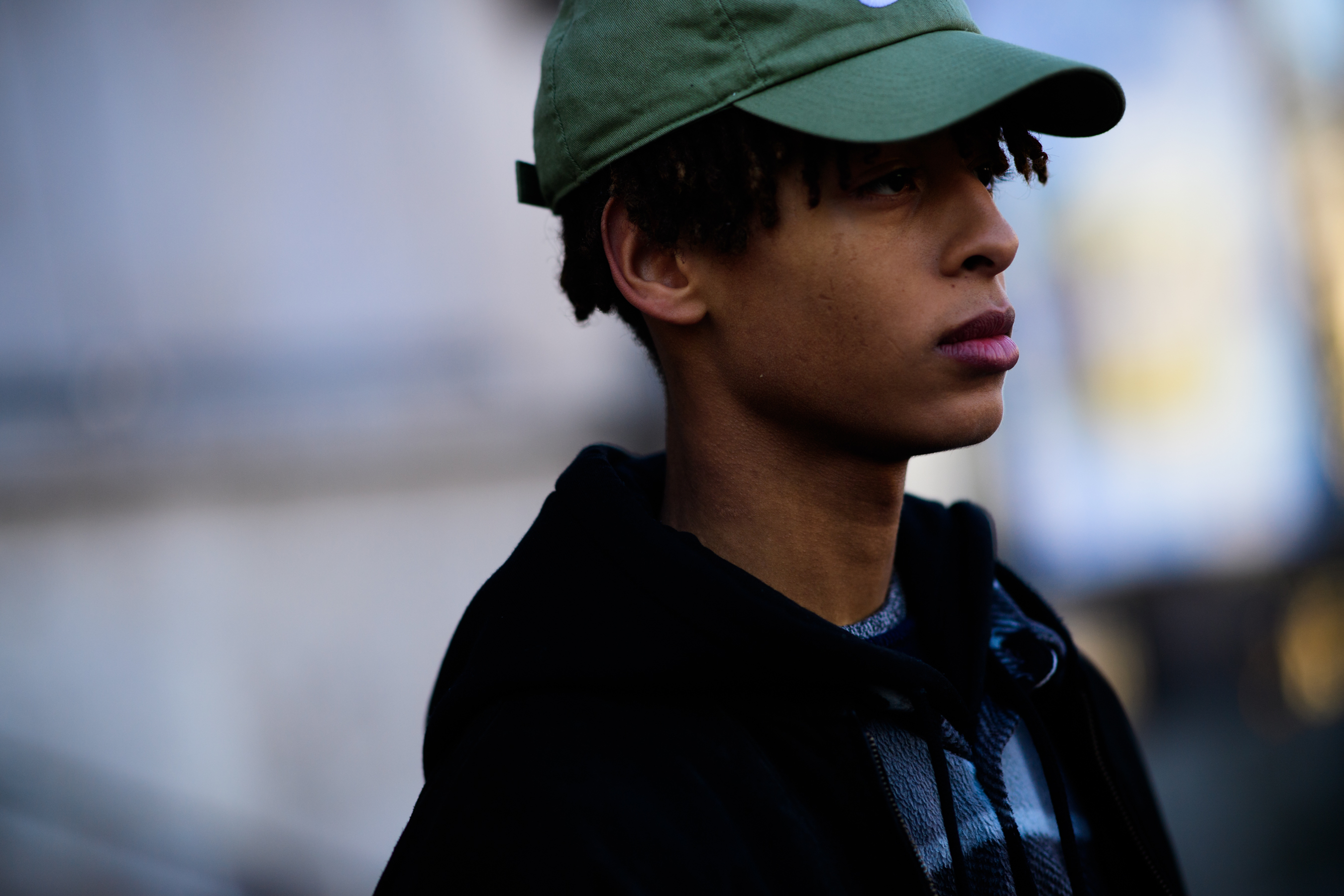 Man wearing green cap nike