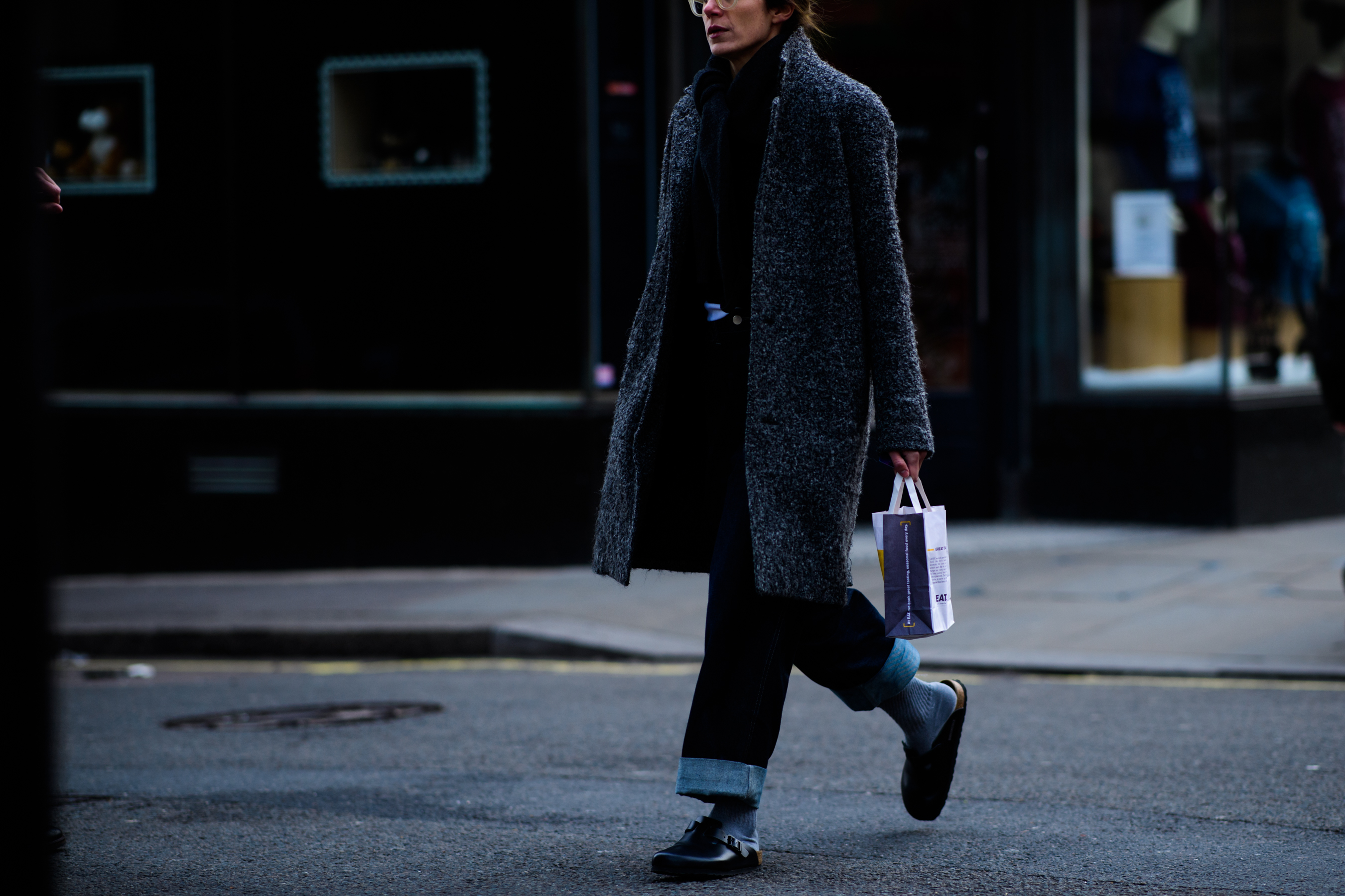 Woman wearing grey coat